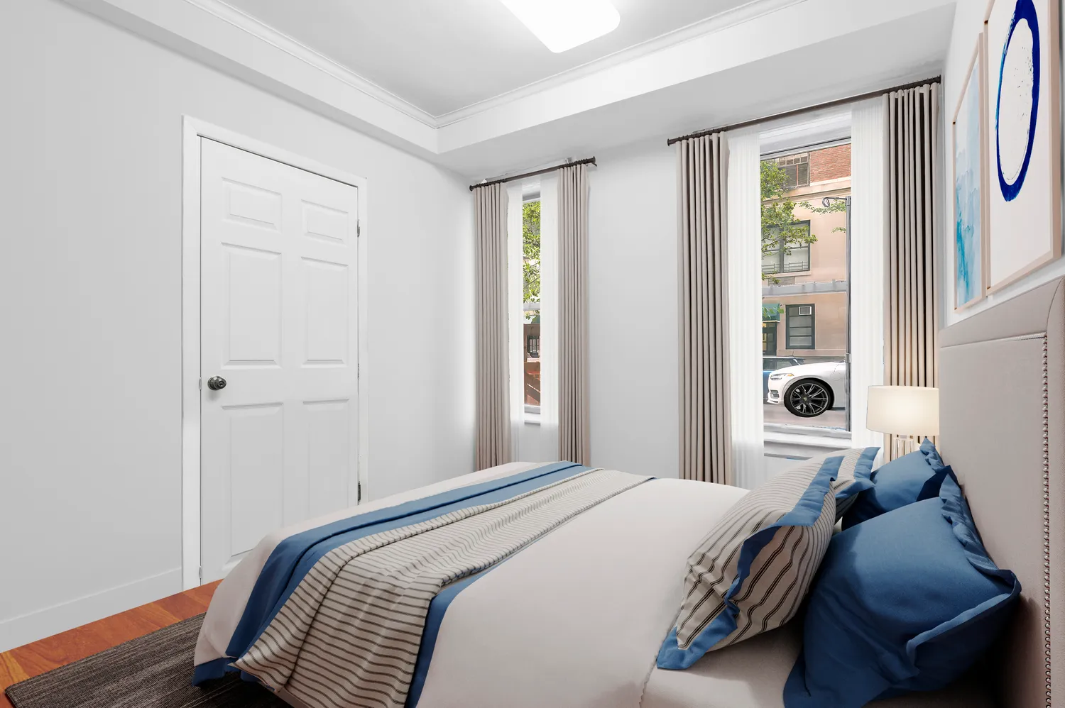 a bedroom with bed and window