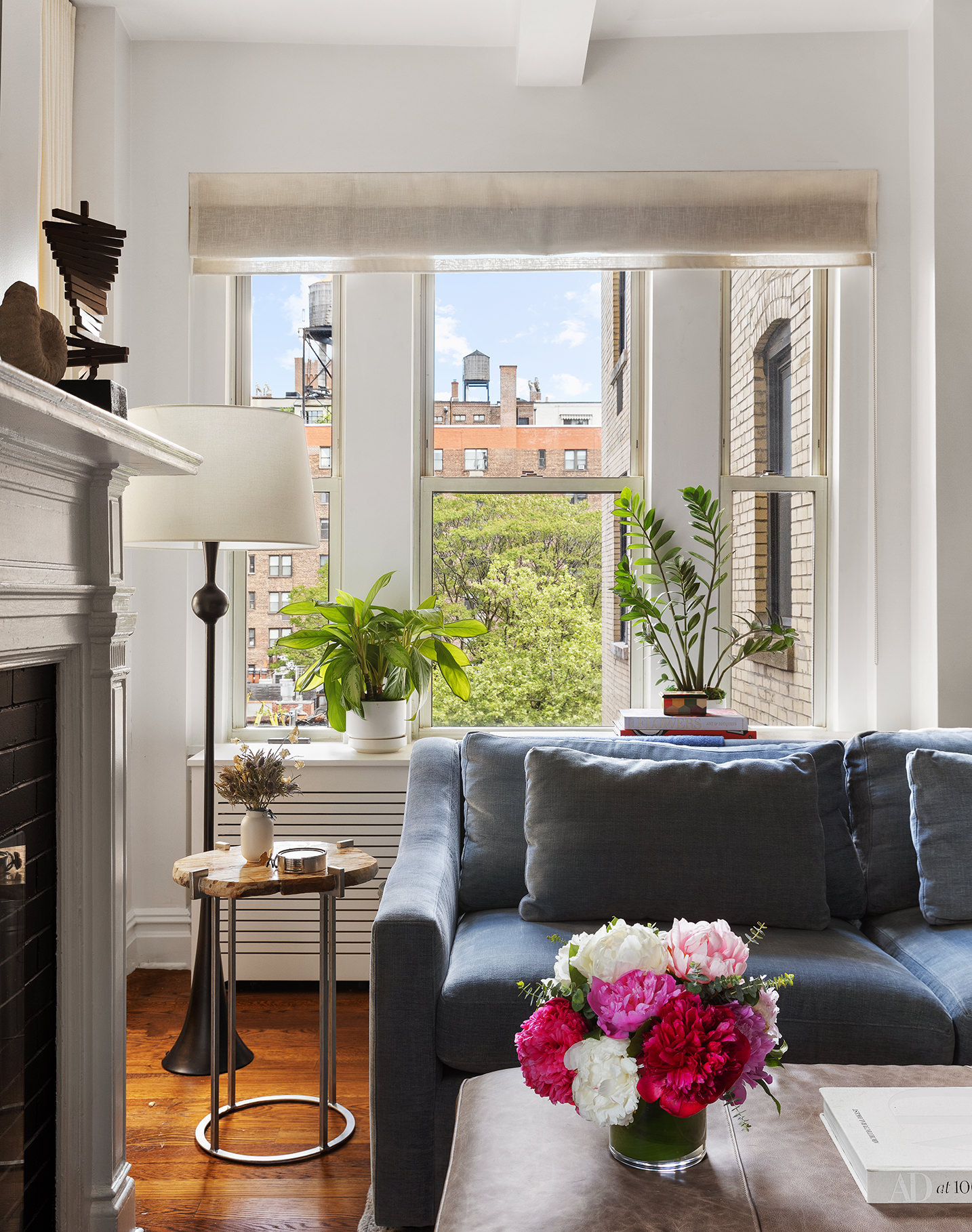 25 5th Avenue, Unit 8F Manhattan, NY 10003 - Photo 2 of 9 a room with furniture and a large window