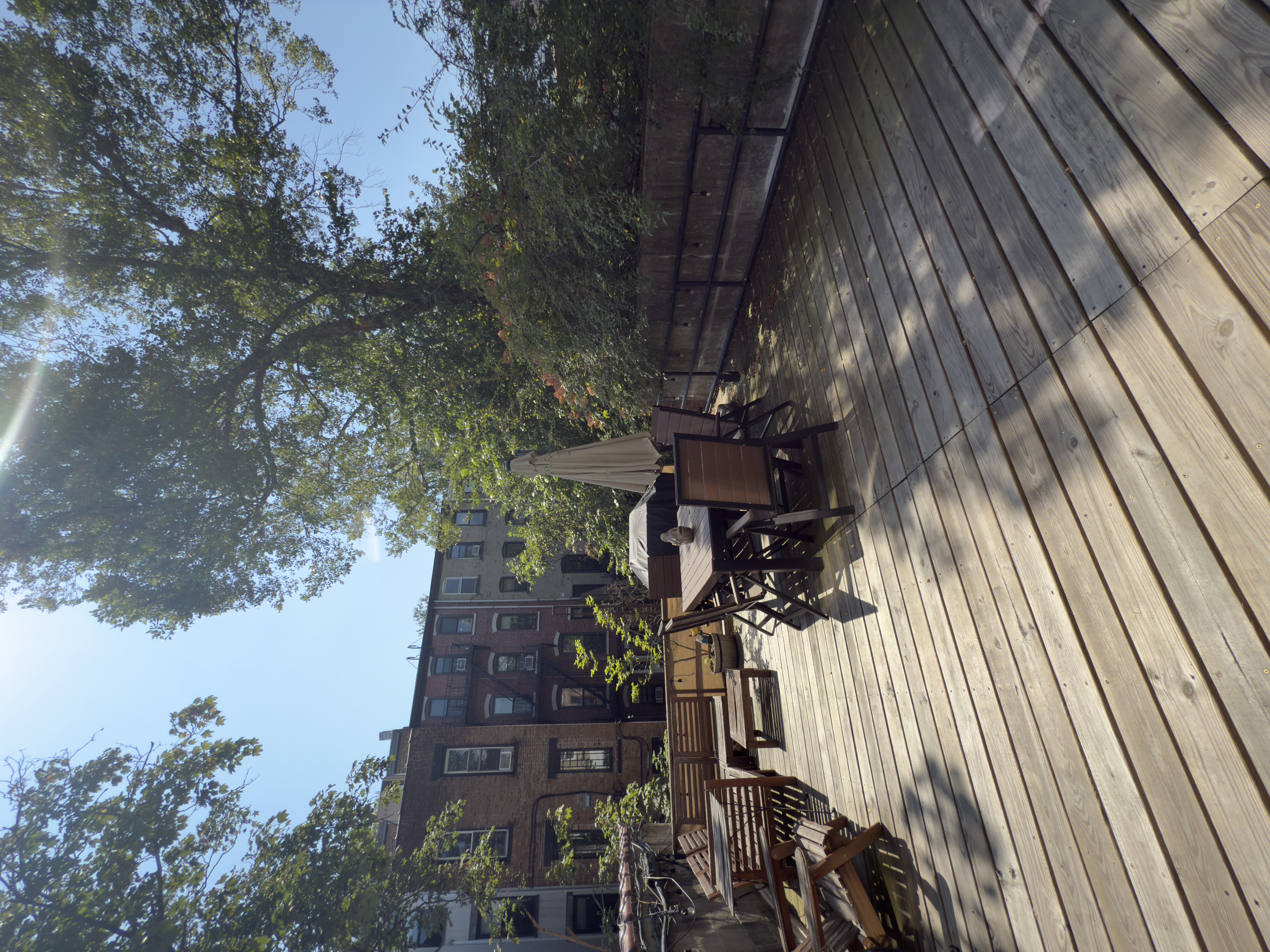 141 7th Avenue, Unit 1 Brooklyn, NY 11215 - Photo 16 of 16 a view of outdoor space with wooden floor and seating space
