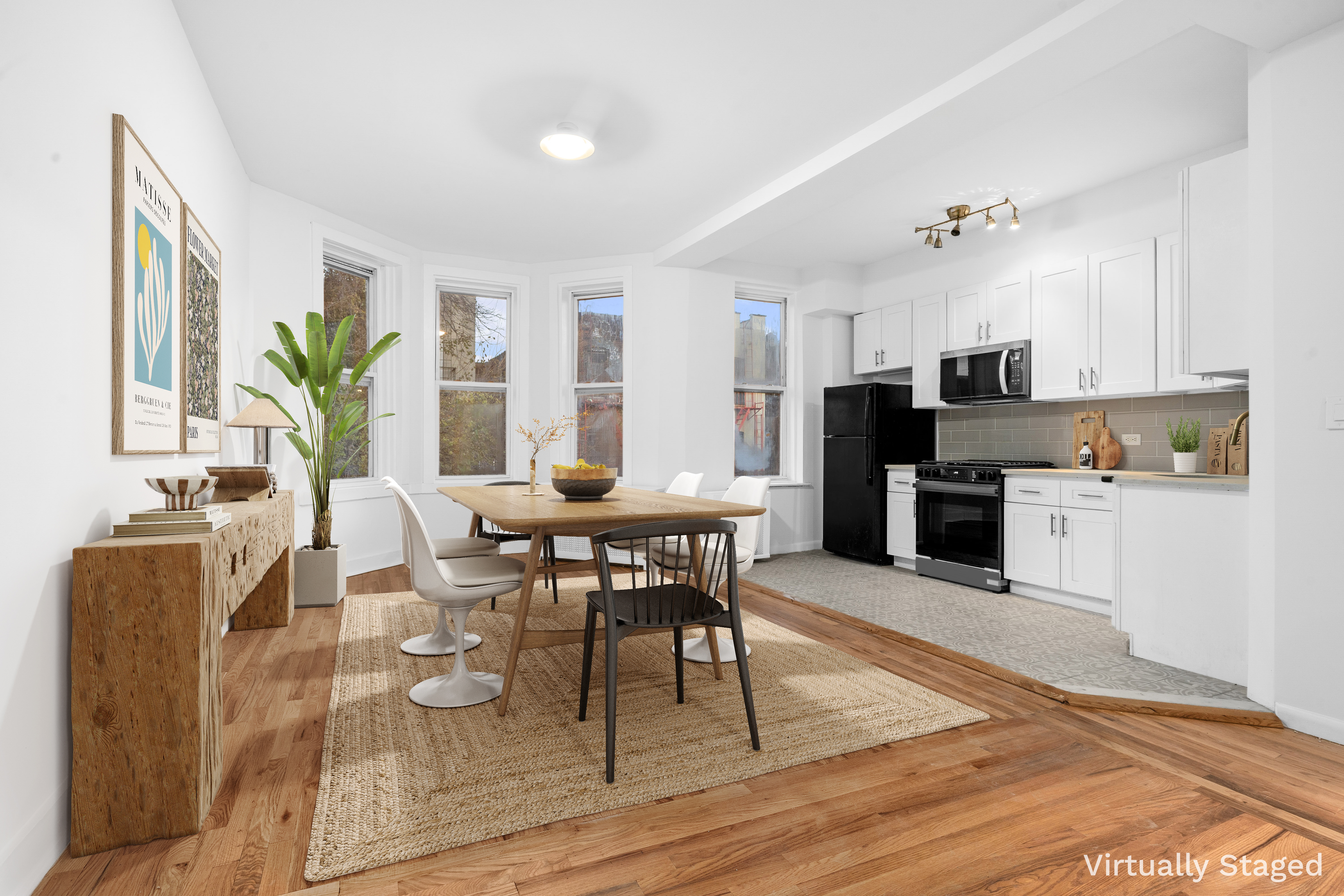 339 East 29th Street Brooklyn, NY 11226 - Photo 2 of 21 a view of a dining room with furniture and wooden floor