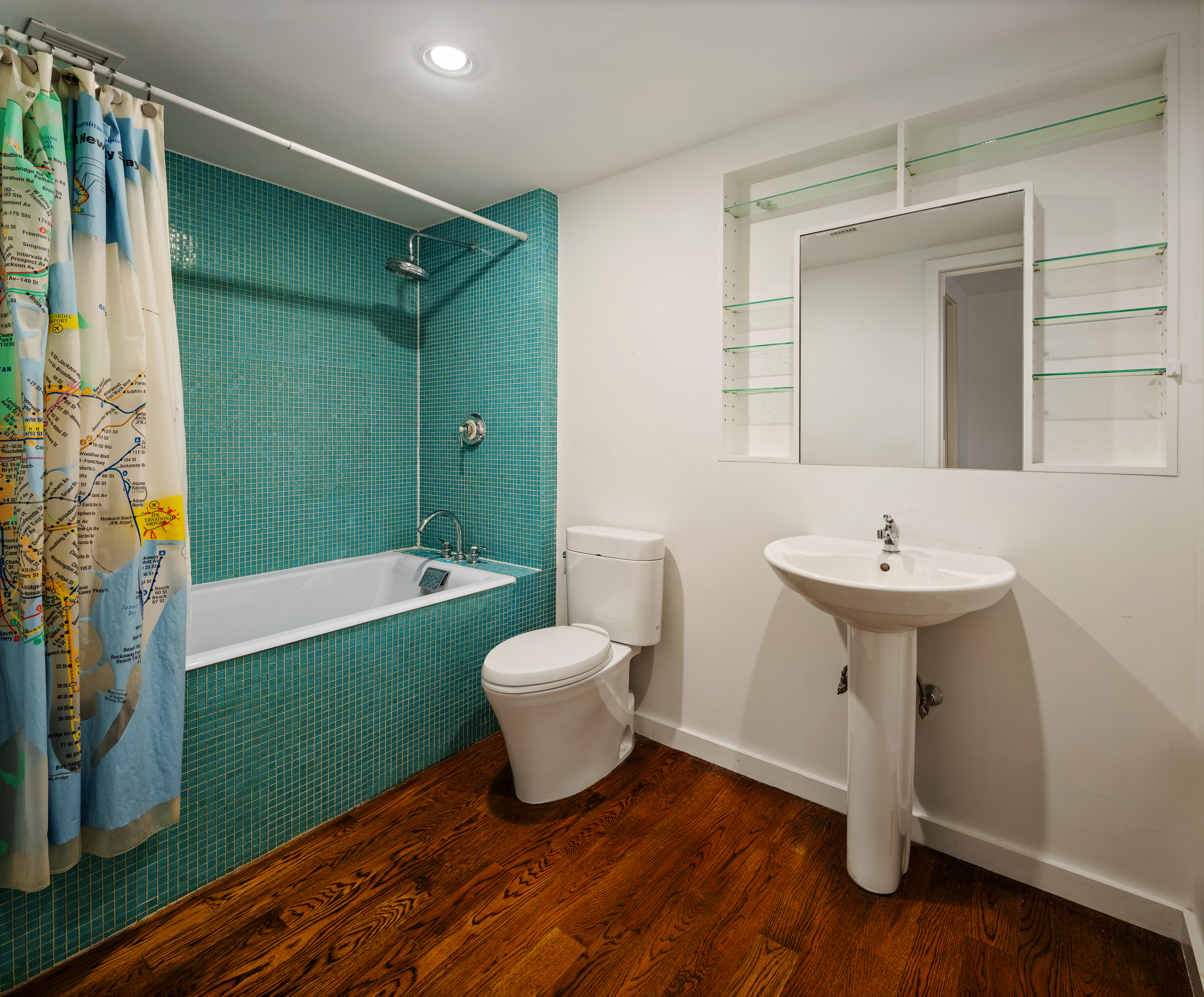 181 Sullivan Street, Unit GARDEN Manhattan, NY 10012 - Photo 9 of 10 a bathroom with a sink toilet and shower