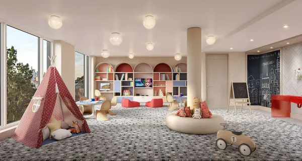 a room with lots of white furniture and a wooden floor