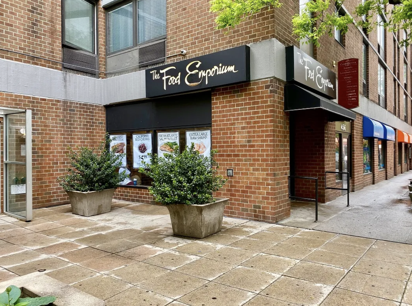 451 West 44th Street, Unit 63 Manhattan, NY 10036 - Photo 24 of 33 a view of a street with potted plants
