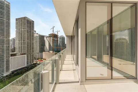 a view of balcony with glass door and glass door