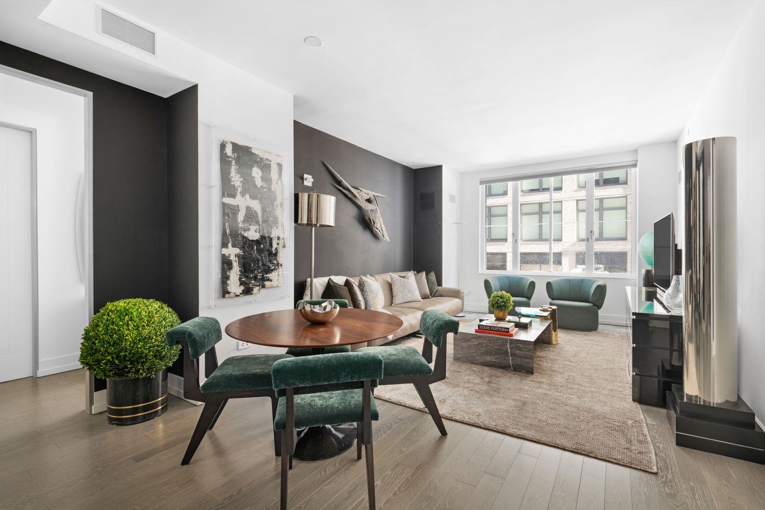 a living room with furniture and a window