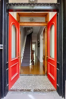 a view of front door with stairs