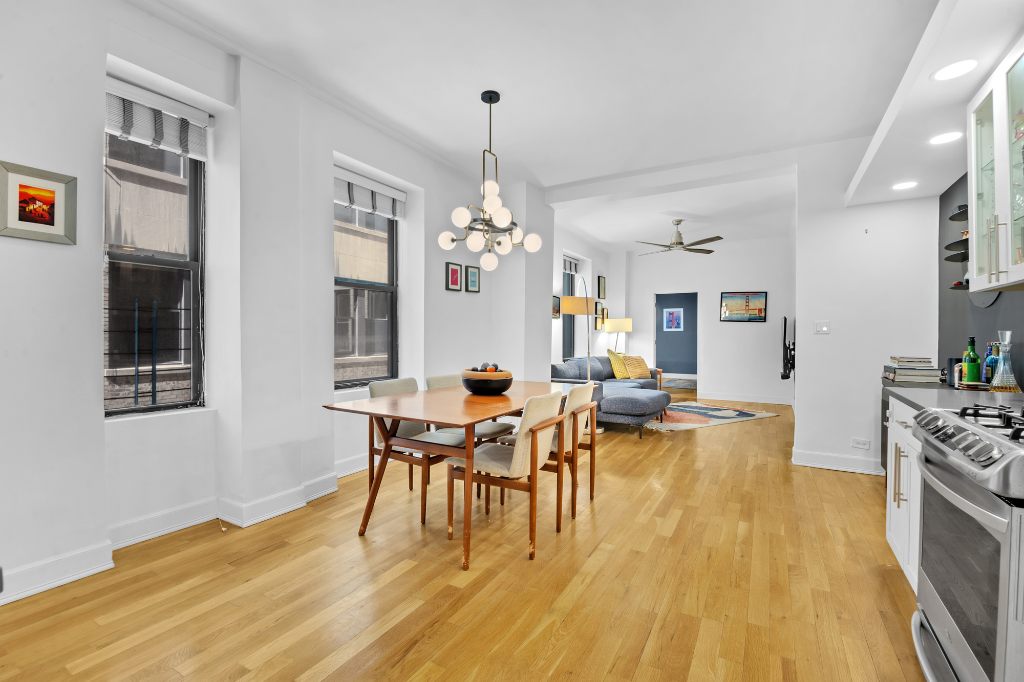 790 Riverside Drive, Unit 2LX Manhattan, NY 10032 - Photo 4 of 10 a view of a dining room with furniture window and wooden floor