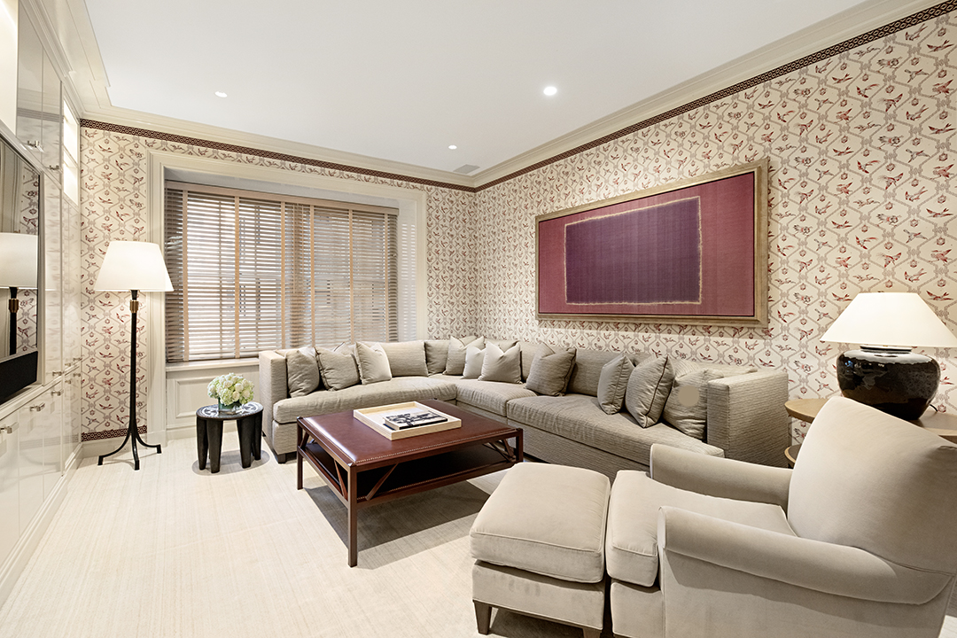 730 Park Avenue, Unit 7/8A Manhattan, NY 10021 - Photo 9 of 26 a living room with furniture and a large window