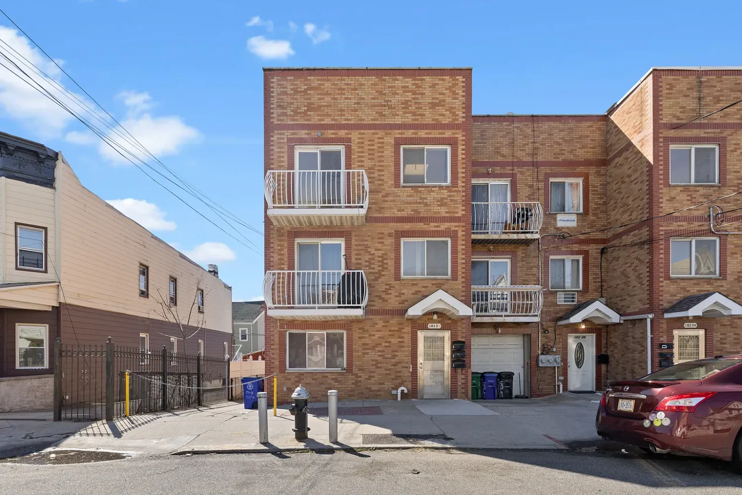 a front view of a building with street view