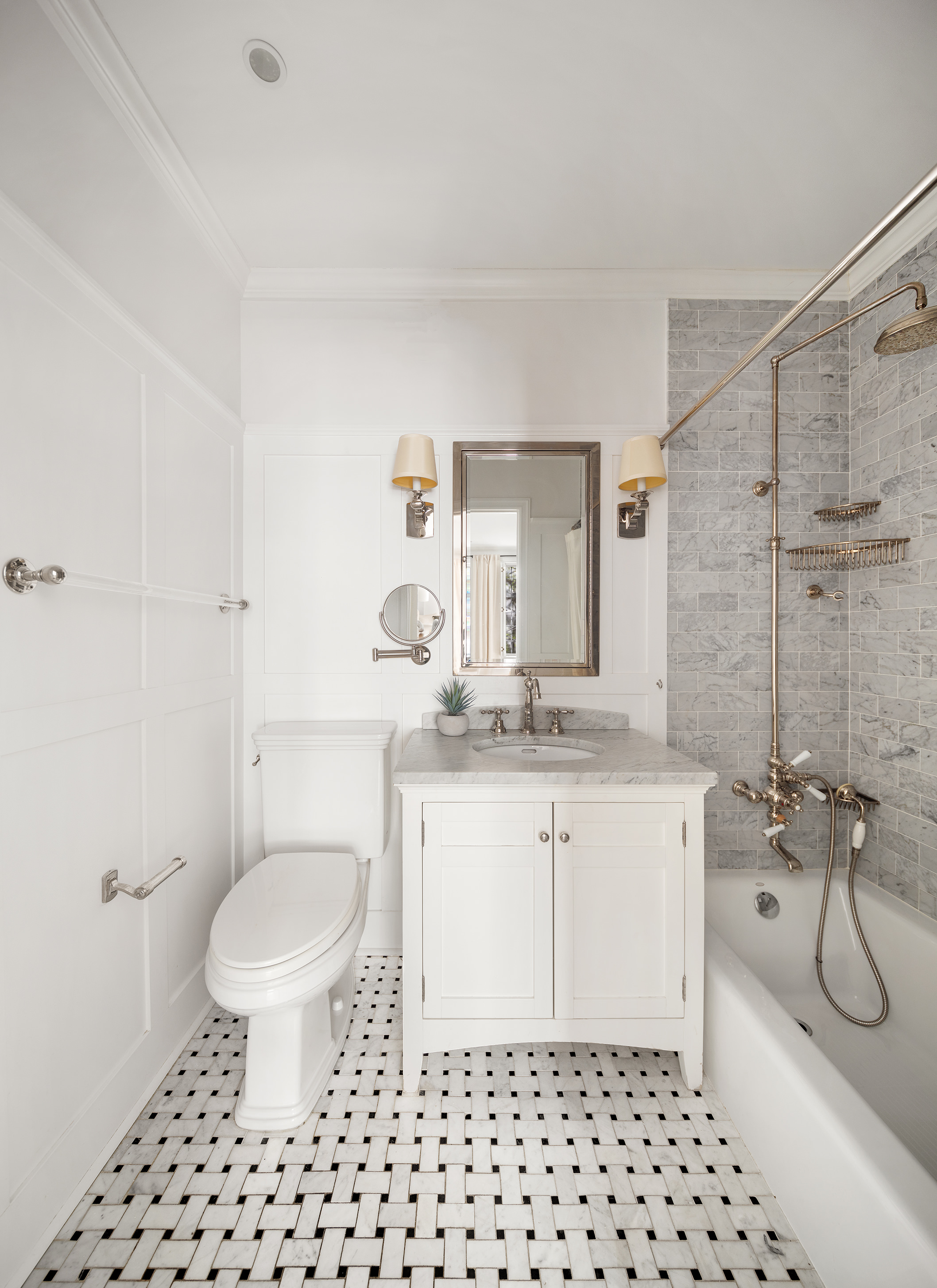 115 East 67th Street, Unit 3C Manhattan, NY 10065 - Photo 12 of 21 a bathroom with a sink toilet a mirror and shower