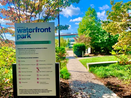 a view of a building with a backyard