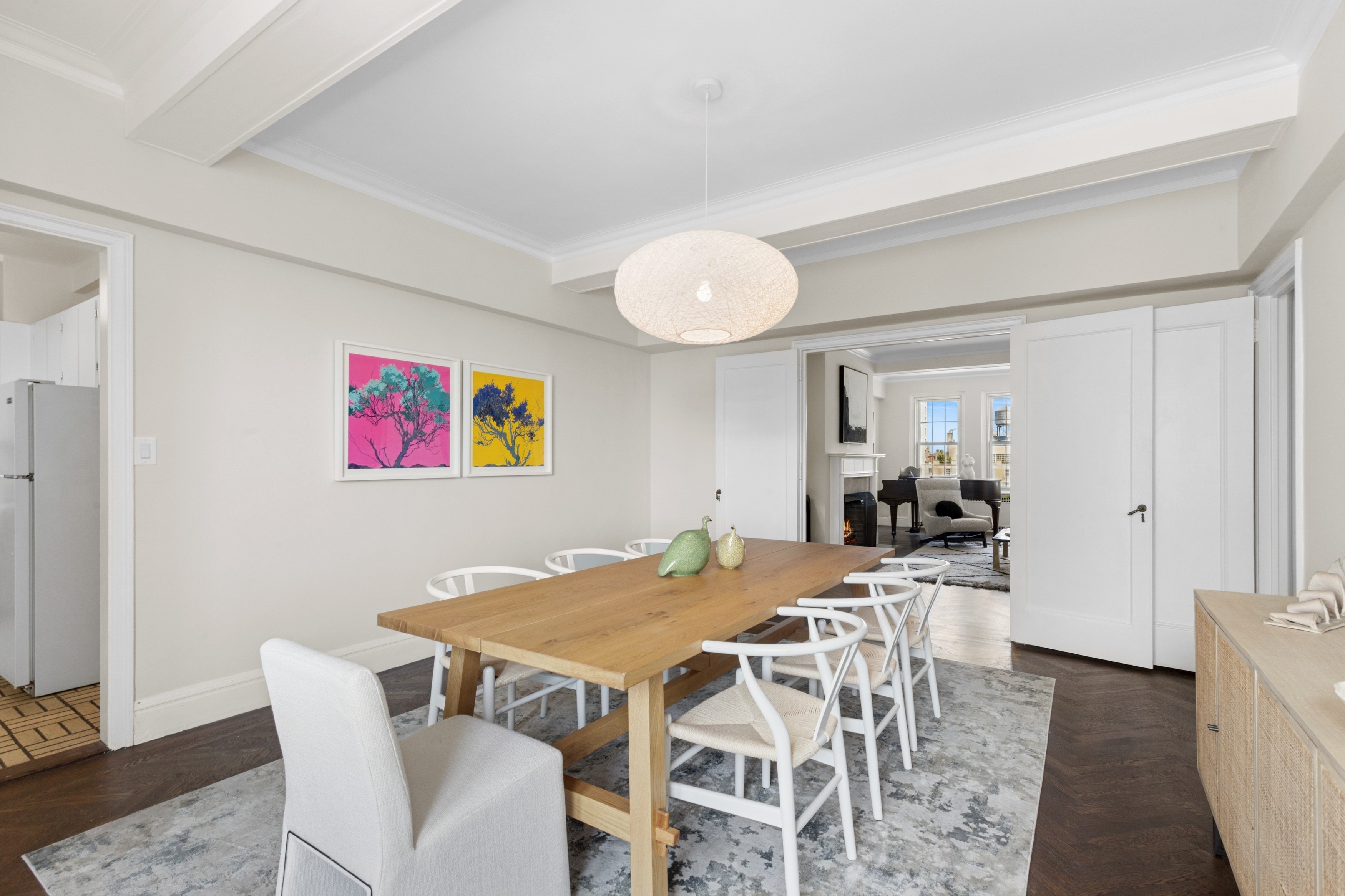 336 Central Park West, Unit 16F Manhattan, NY 10025 - Photo 6 of 18 a view of a dining room with furniture and wooden floor