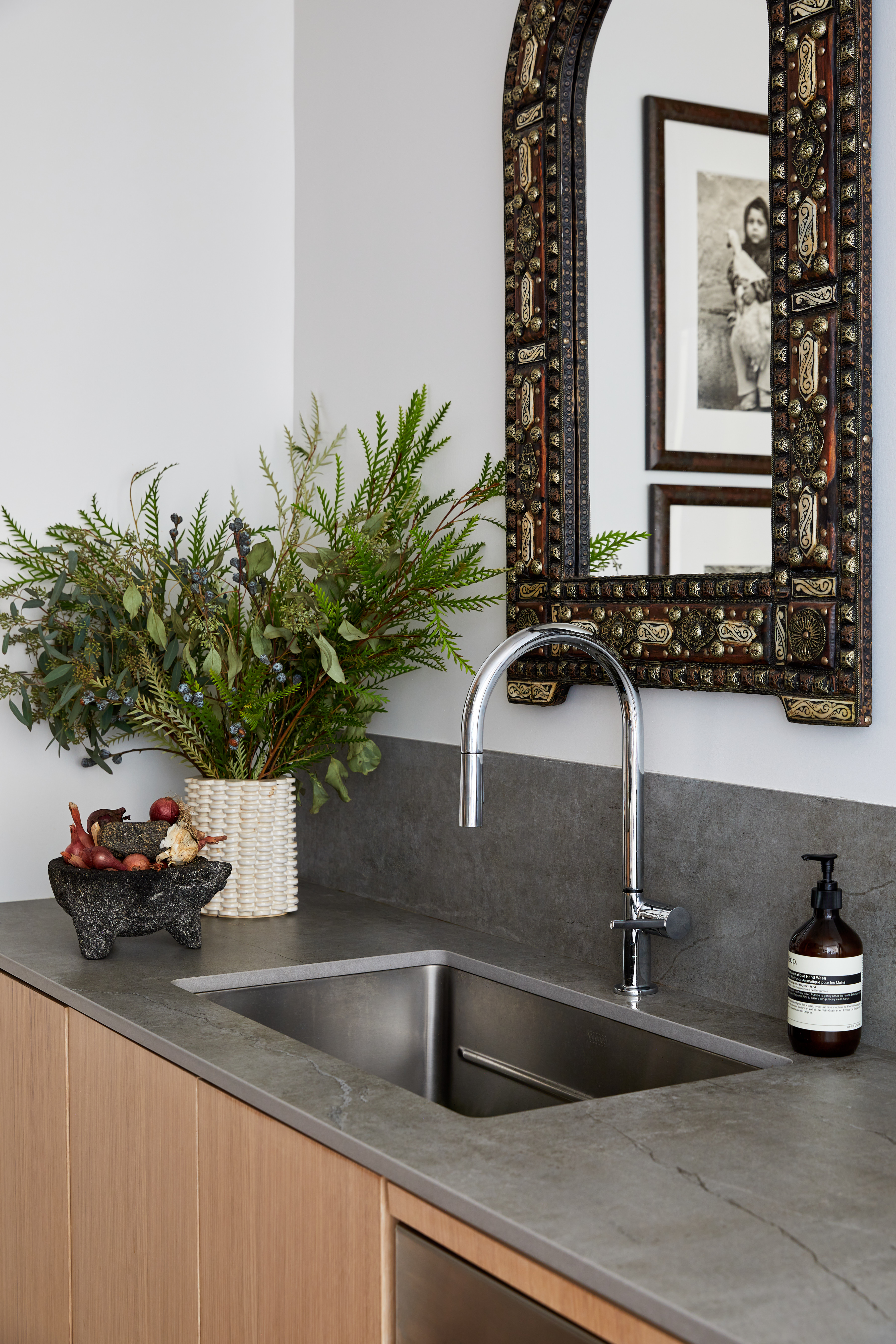 30 5th Avenue, Unit 16H Manhattan, NY 10011 - Photo 9 of 15 a bathroom sink with a potted plant