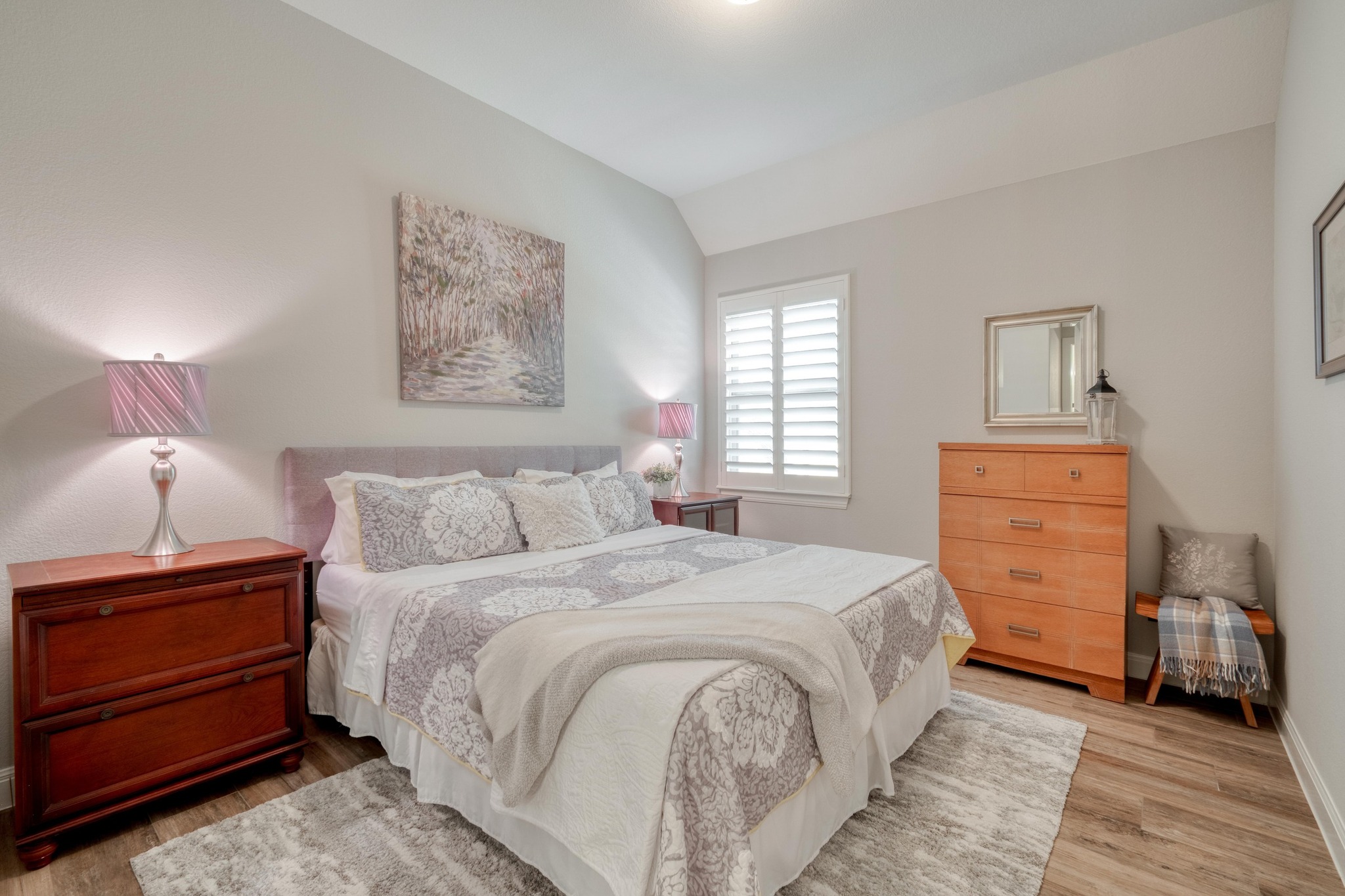 3836 Kyler Glen Road Round Rock, TX 78681 - Photo 31 of 41 a bedroom with a bed and a dresser