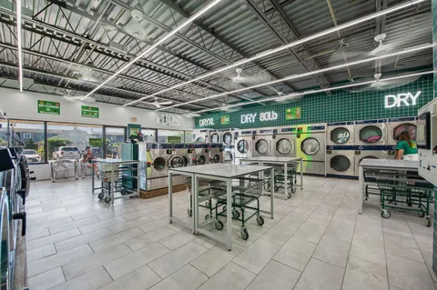a view of a chairs and tables in a room