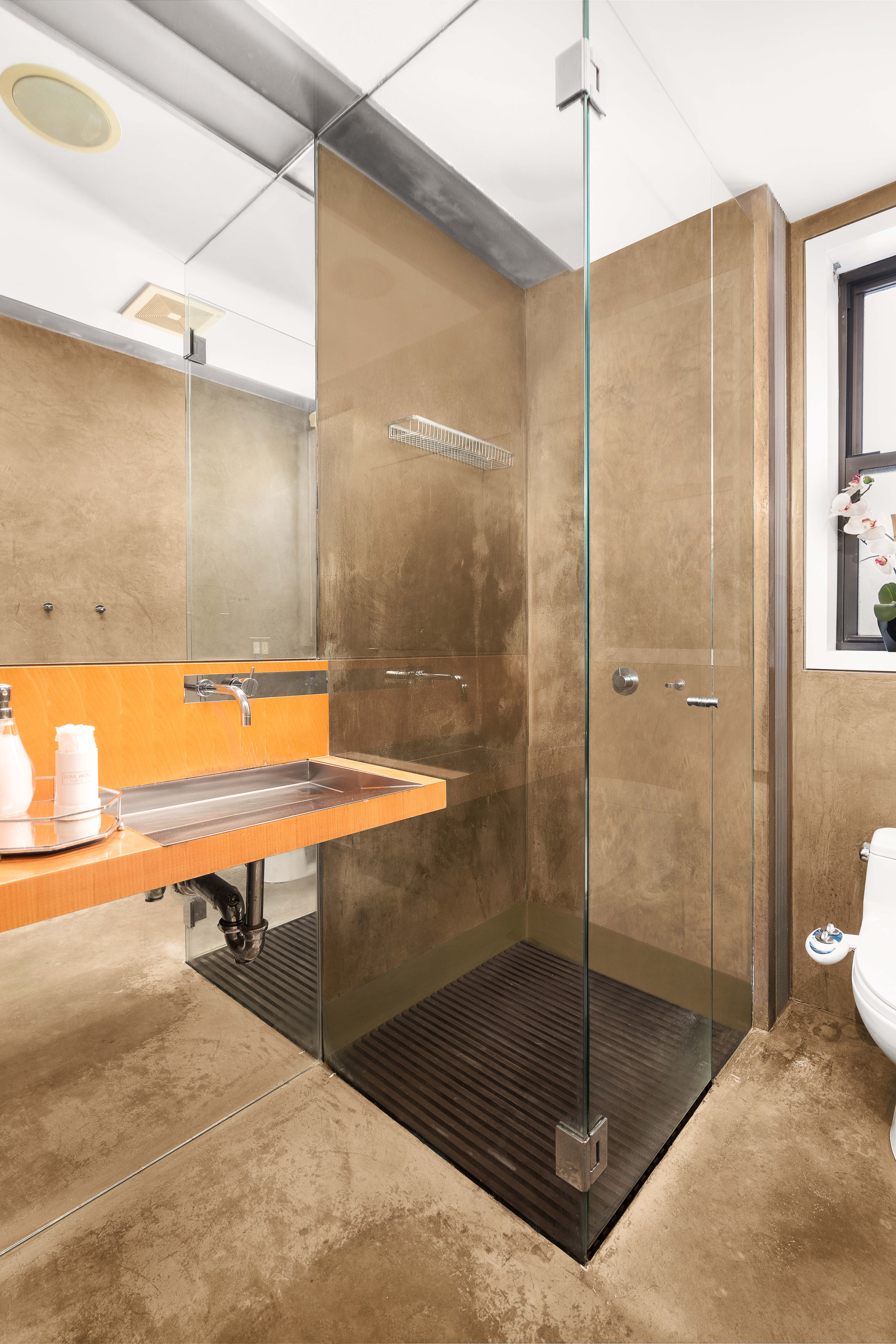 340 West 19th Street, Unit 14 Manhattan, NY 10011 - Photo 9 of 12 a bathroom with a shower and a sink