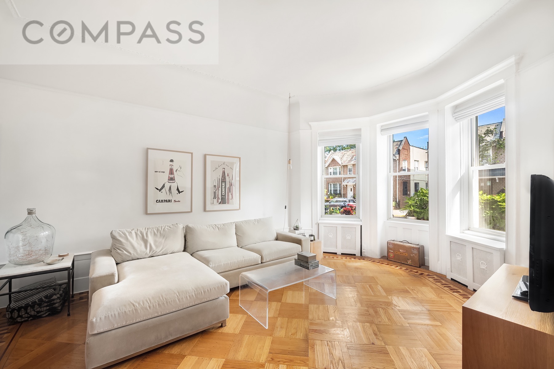 a bedroom with furniture and a window