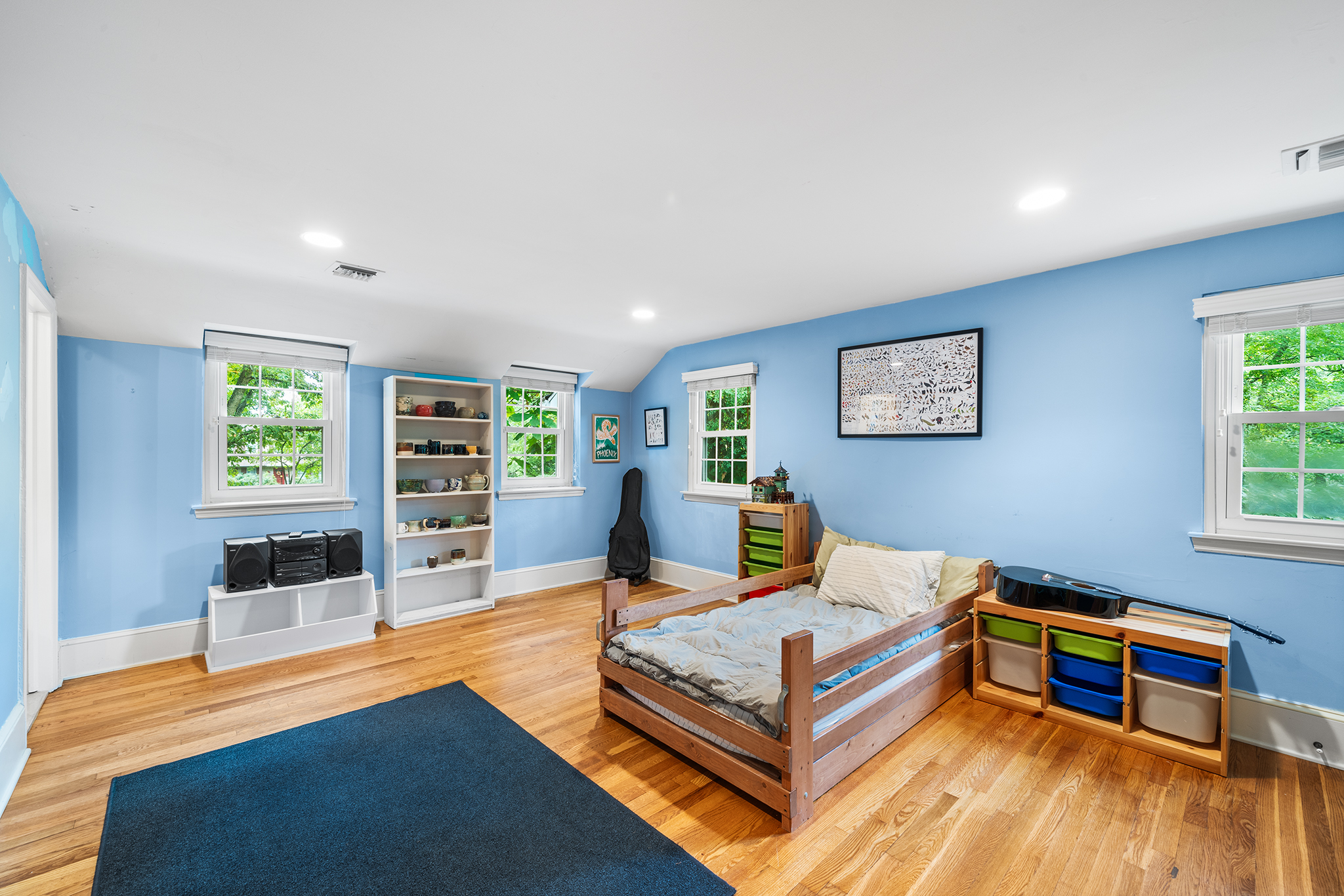 718 Arlington Road Narberth, PA 19072 - Photo 22 of 47 a bedroom with a bed and a wooden floor