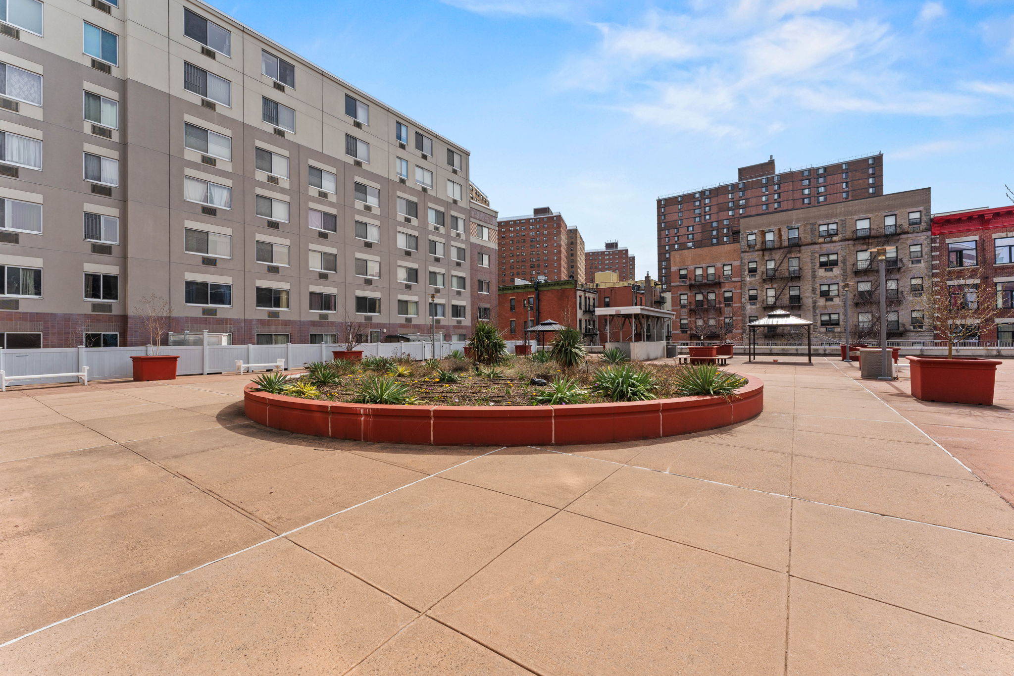 300 West 145th Street, Unit 6G Manhattan, NY 10039 - Photo 11 of 19 a view of roof with building and city view