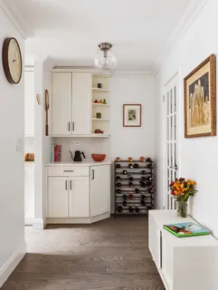 a kitchen with stainless steel appliances a stove and cabinets