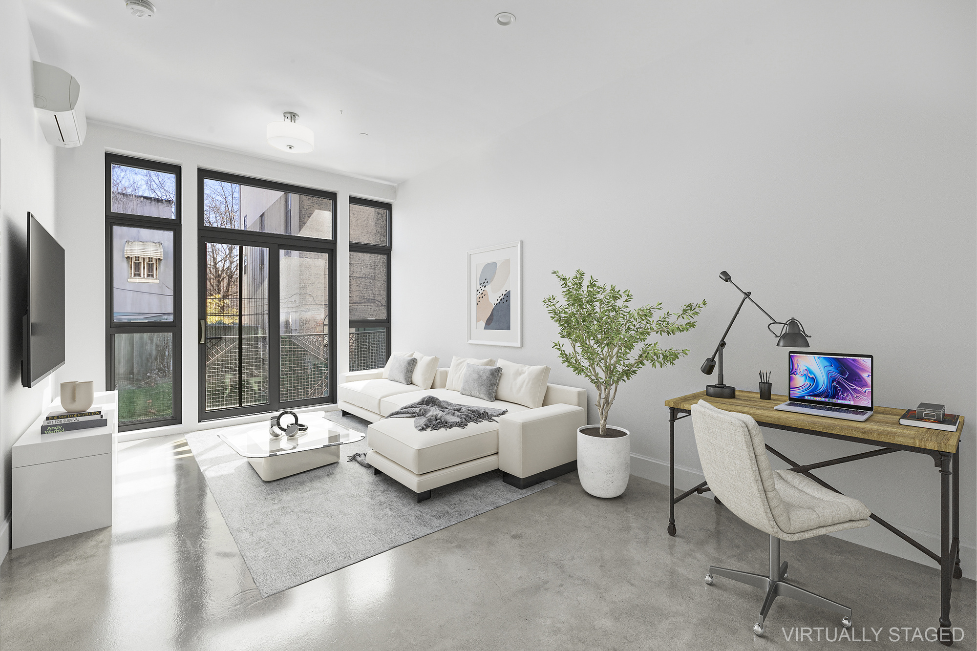 a living room with furniture and large windows
