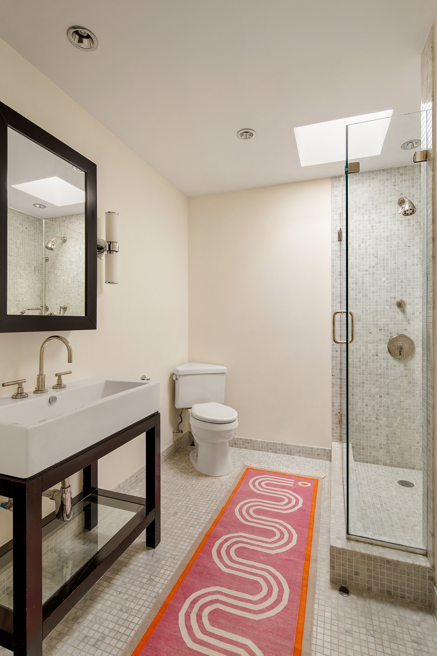 366 6th Avenue Brooklyn, NY 11215 - Photo 16 of 20 a bathroom with a sink and a mirror
