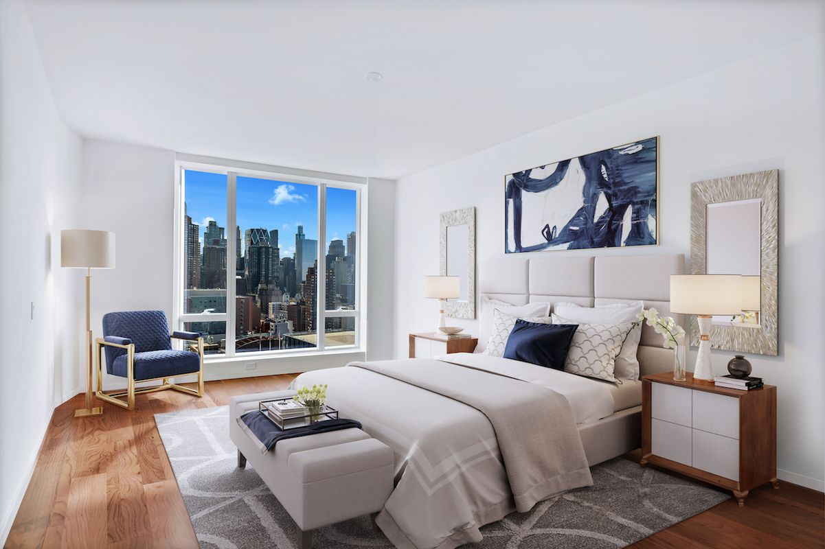 1 West End Avenue, Unit 27D Manhattan, NY 10023 - Photo 2 of 21 a bedroom with furniture and a large window