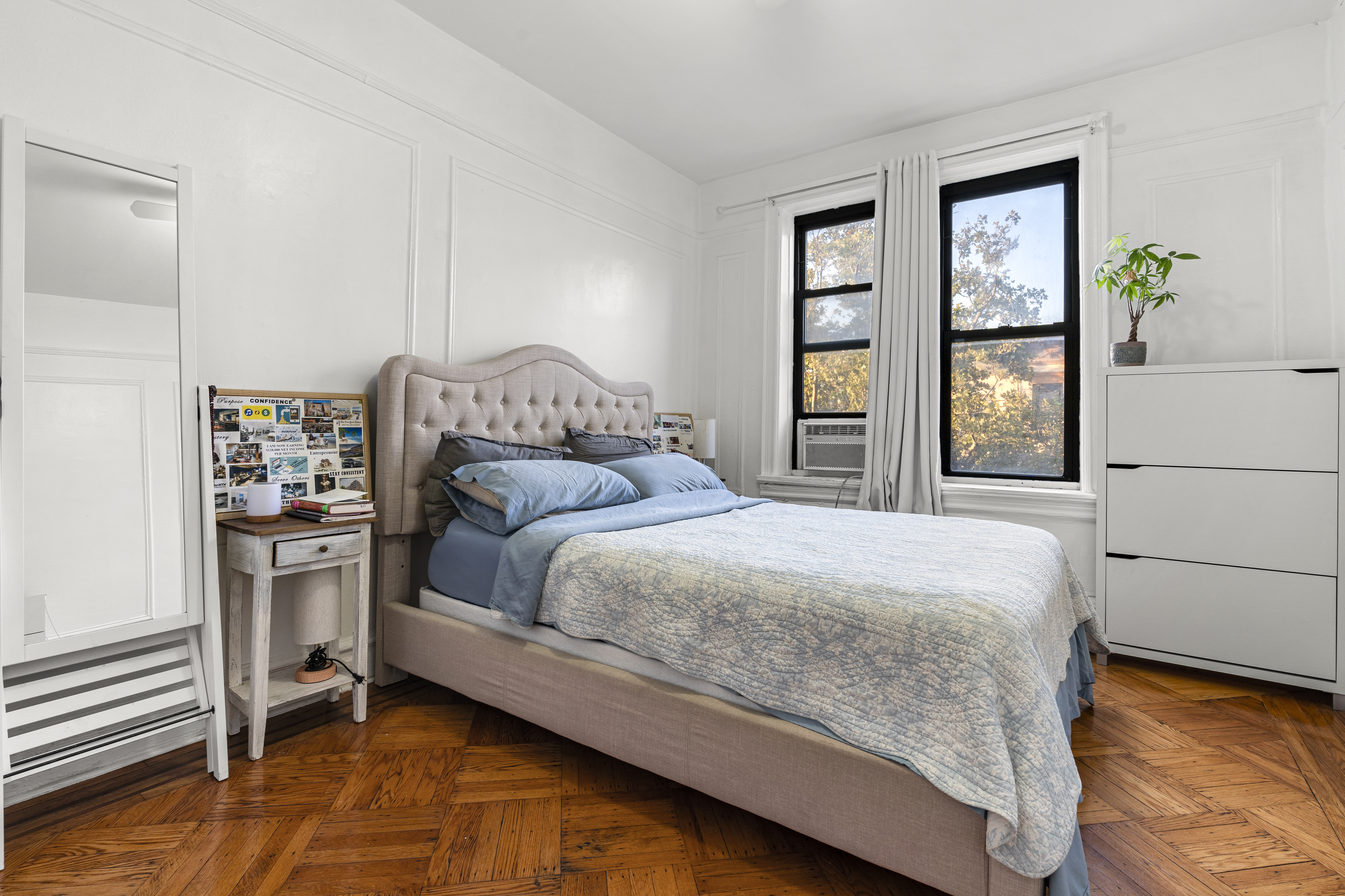 44 St Nicholas Avenue Brooklyn, NY 11237 - Photo 5 of 11 a bedroom with a bed and a window