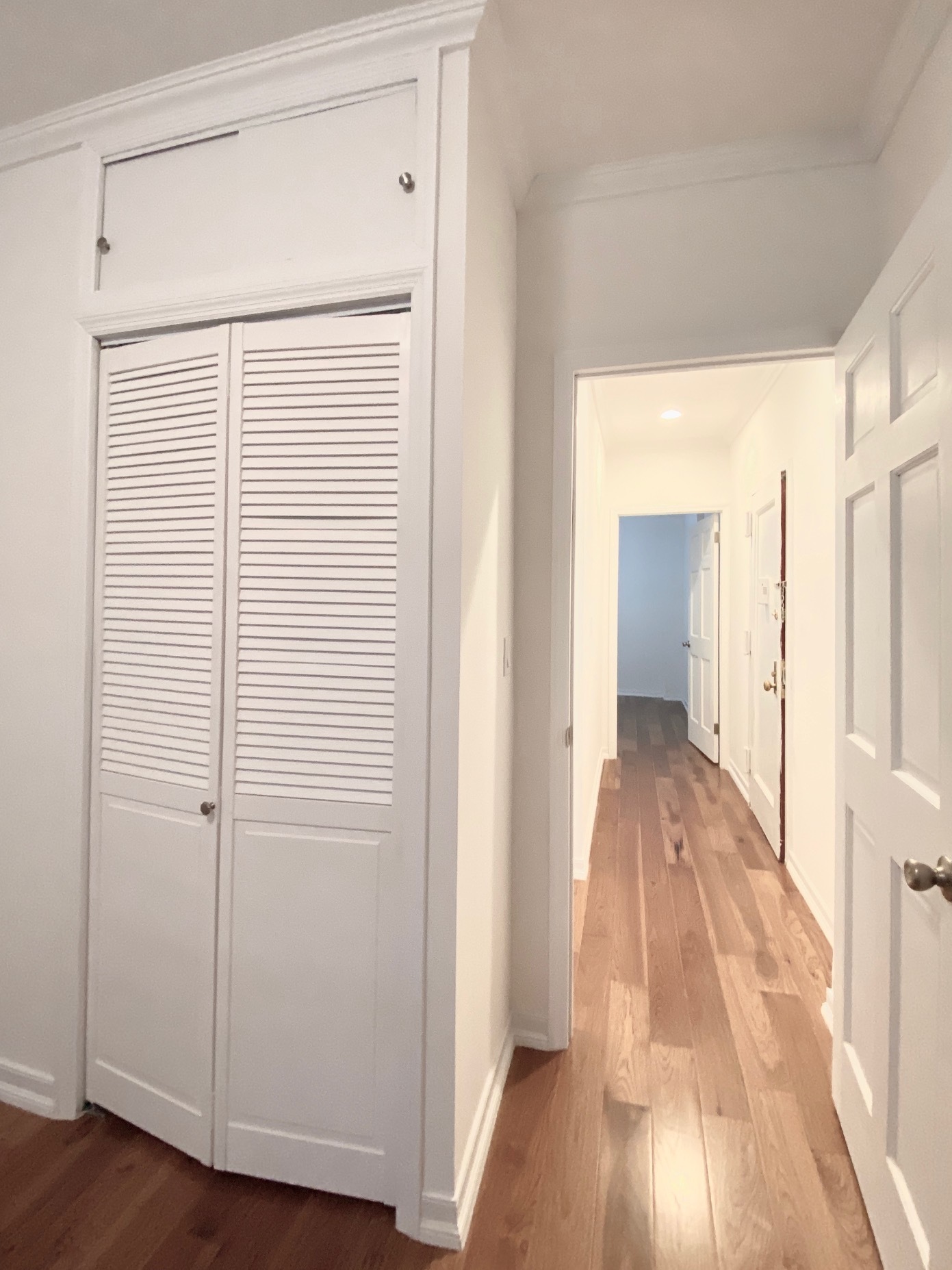 573 6th Street, Unit 1 Brooklyn, NY 11215 - Photo 6 of 10 a view of a hallway with wooden floor