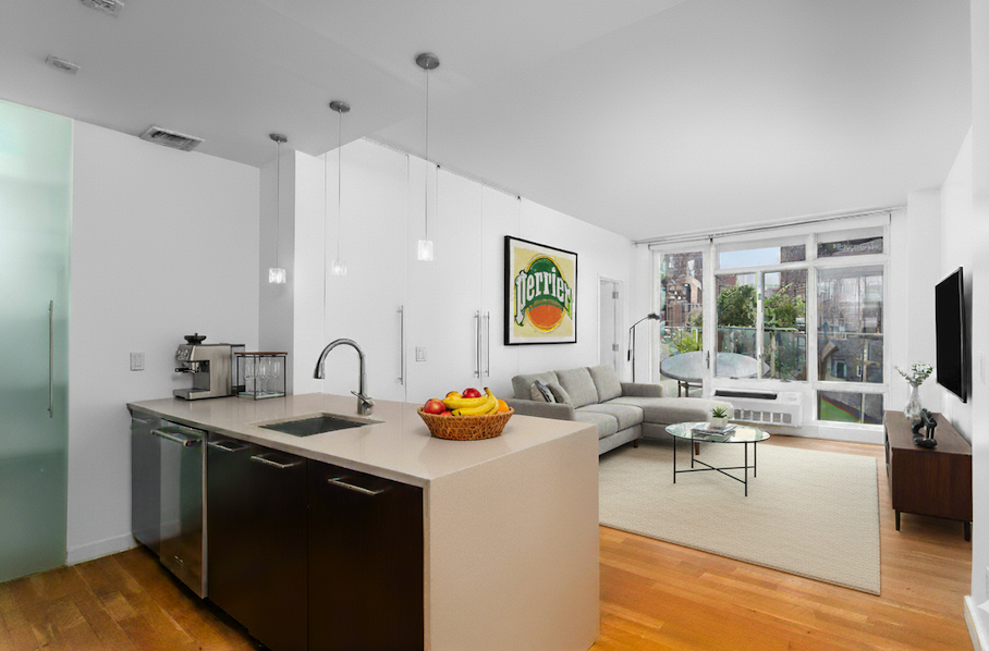 342 East 110th Street, Unit 3D Manhattan, NY 10029 - Photo 1 of 15 a living room with furniture and a flat screen tv