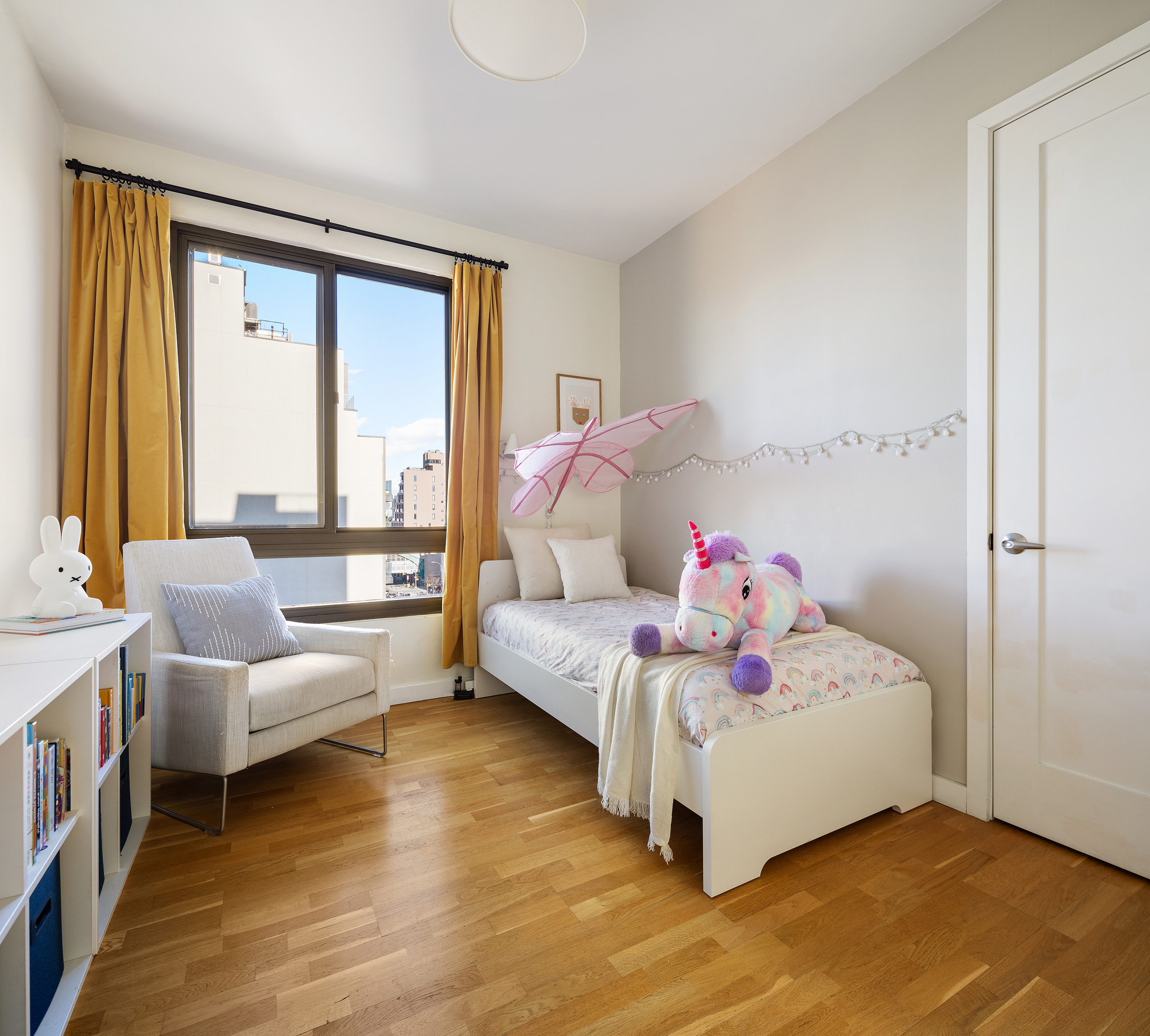 500 4th Avenue, Unit 7C Brooklyn, NY 11215 - Photo 8 of 12 a bedroom with a bed and large window