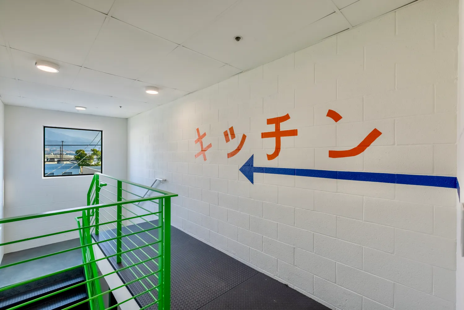 a view of a storage & utility room with a washer dryer