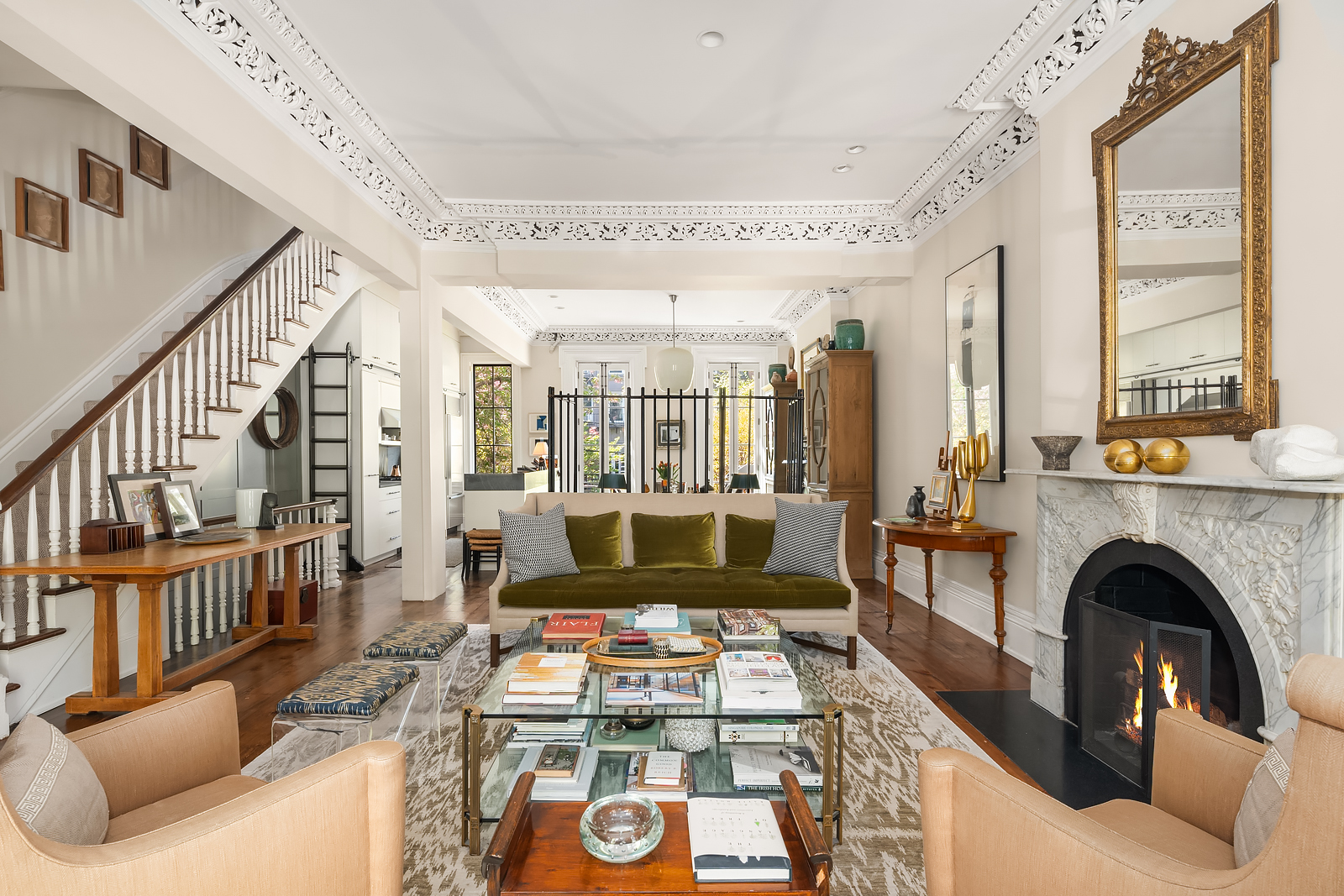 204 Warren Street Brooklyn, NY 11201 - Photo 3 of 29 a living room with furniture and a fireplace