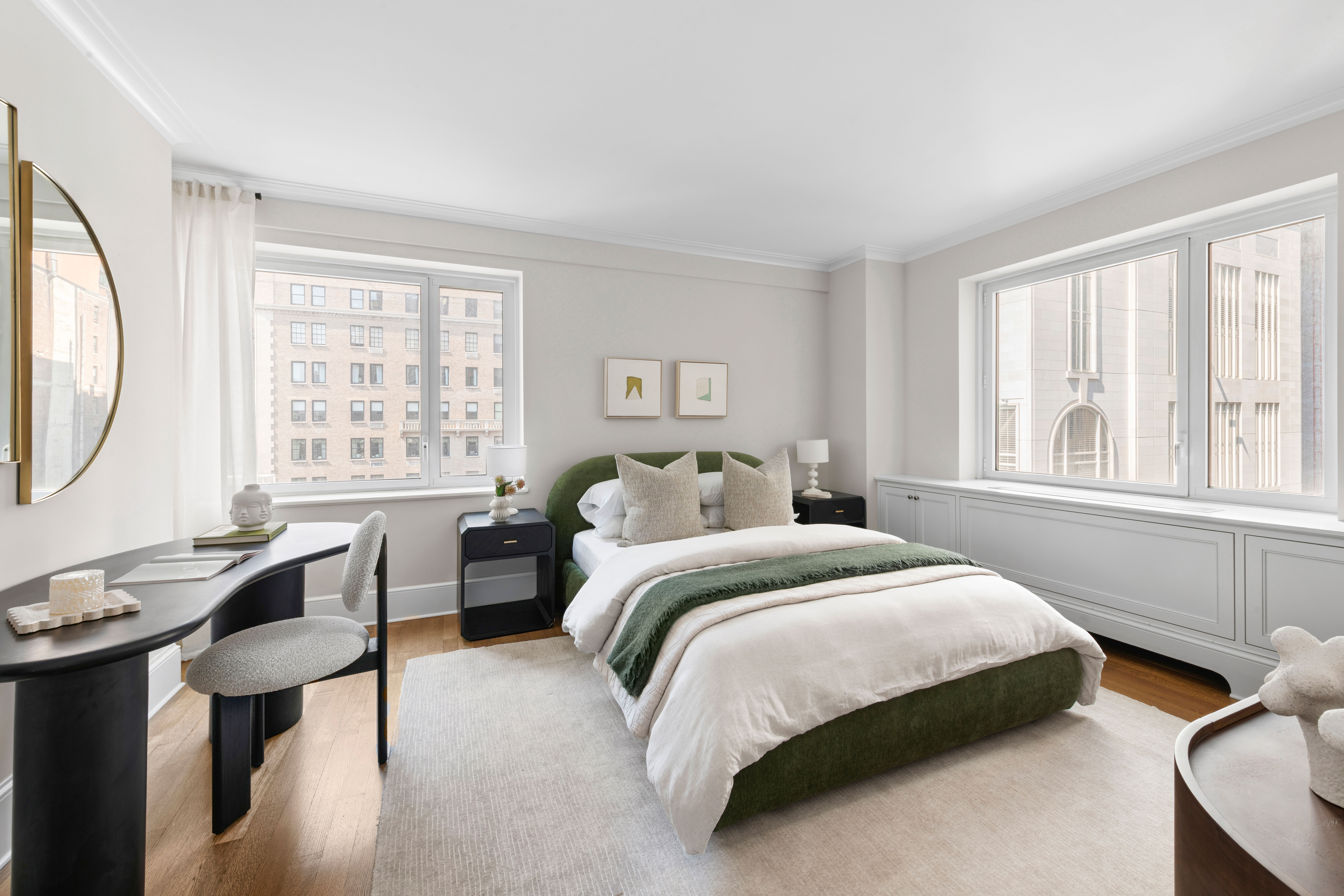 530 Park Avenue, Unit 12A Manhattan, NY 10065 - Photo 14 of 27 a bedroom with bed and a large window