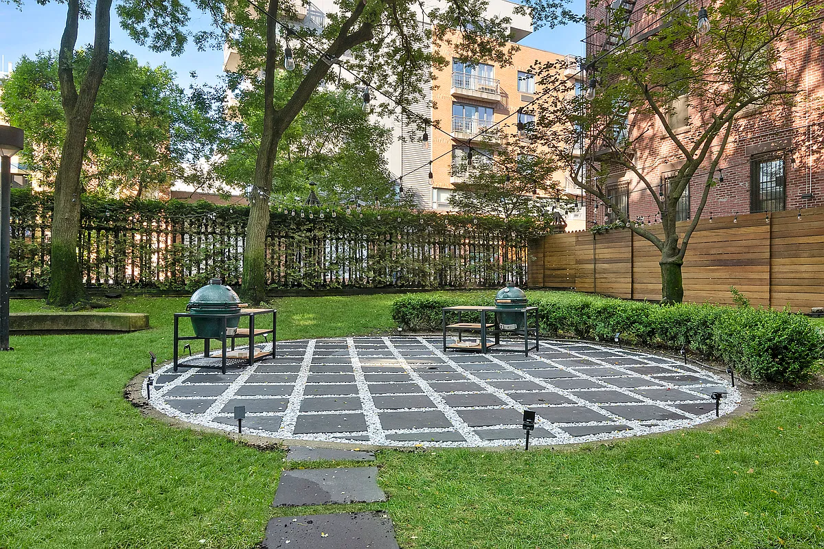 505 Court Street, Unit 9G Brooklyn, NY 11231 - Photo 6 of 11 a view of a chair and table in the garden