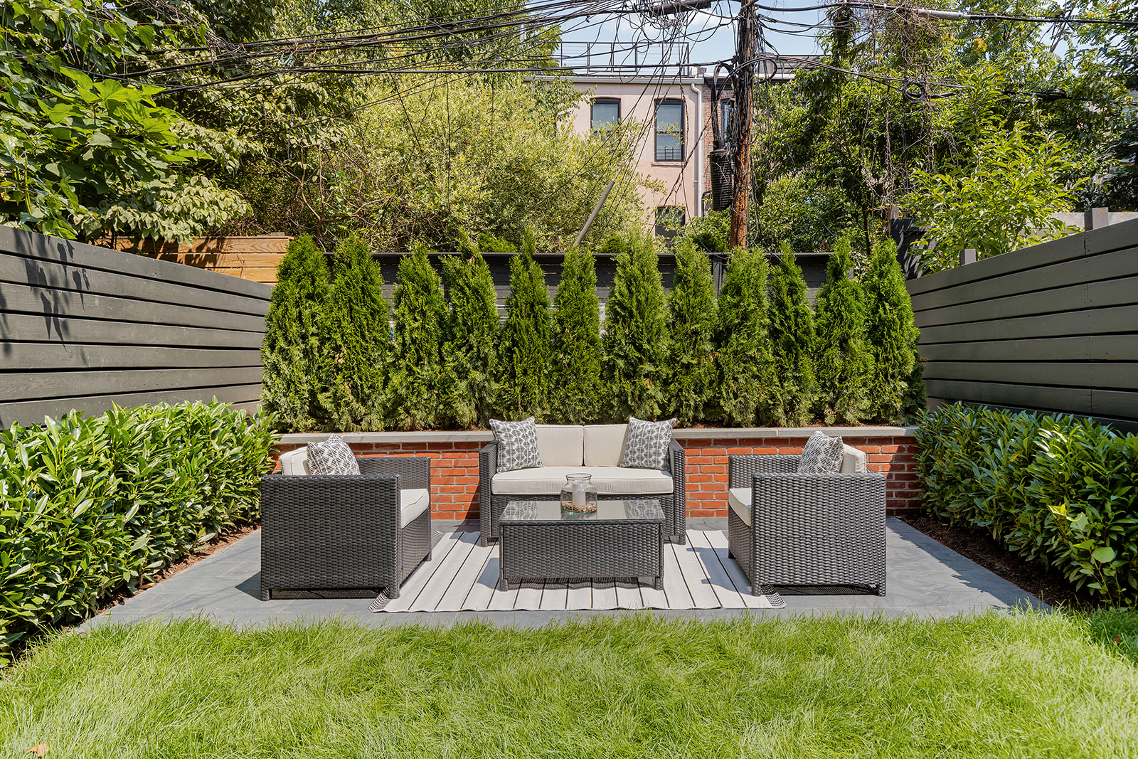 281 Jefferson Avenue Brooklyn, NY 11216 - Photo 6 of 25 a view of a patio with table and chairs and potted plants