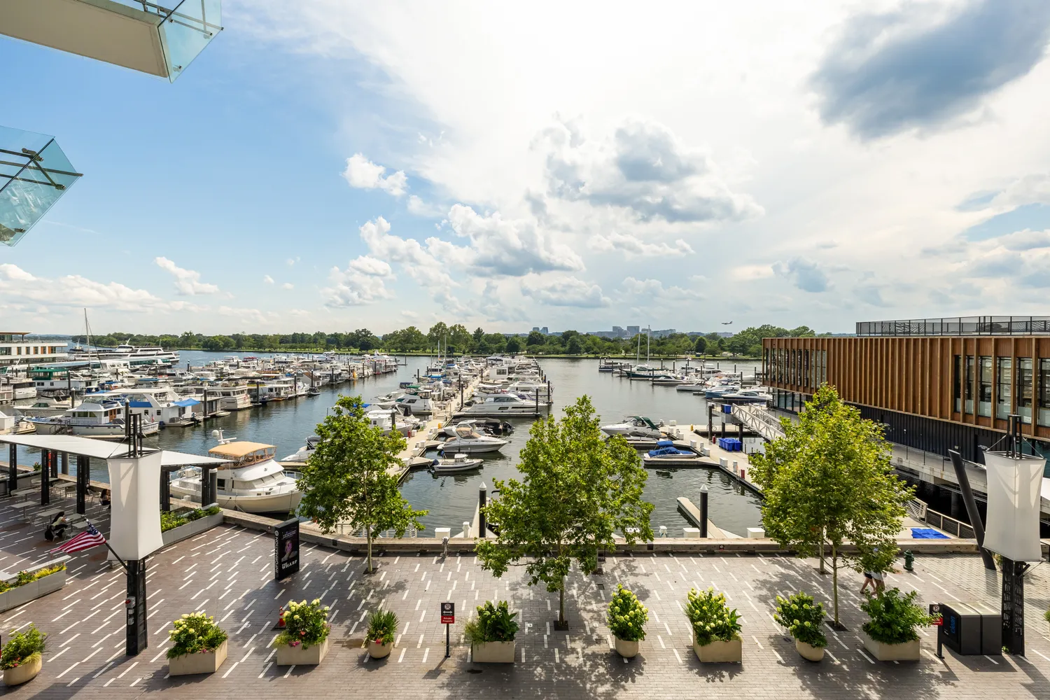 a bedroom with a bed next to a window
