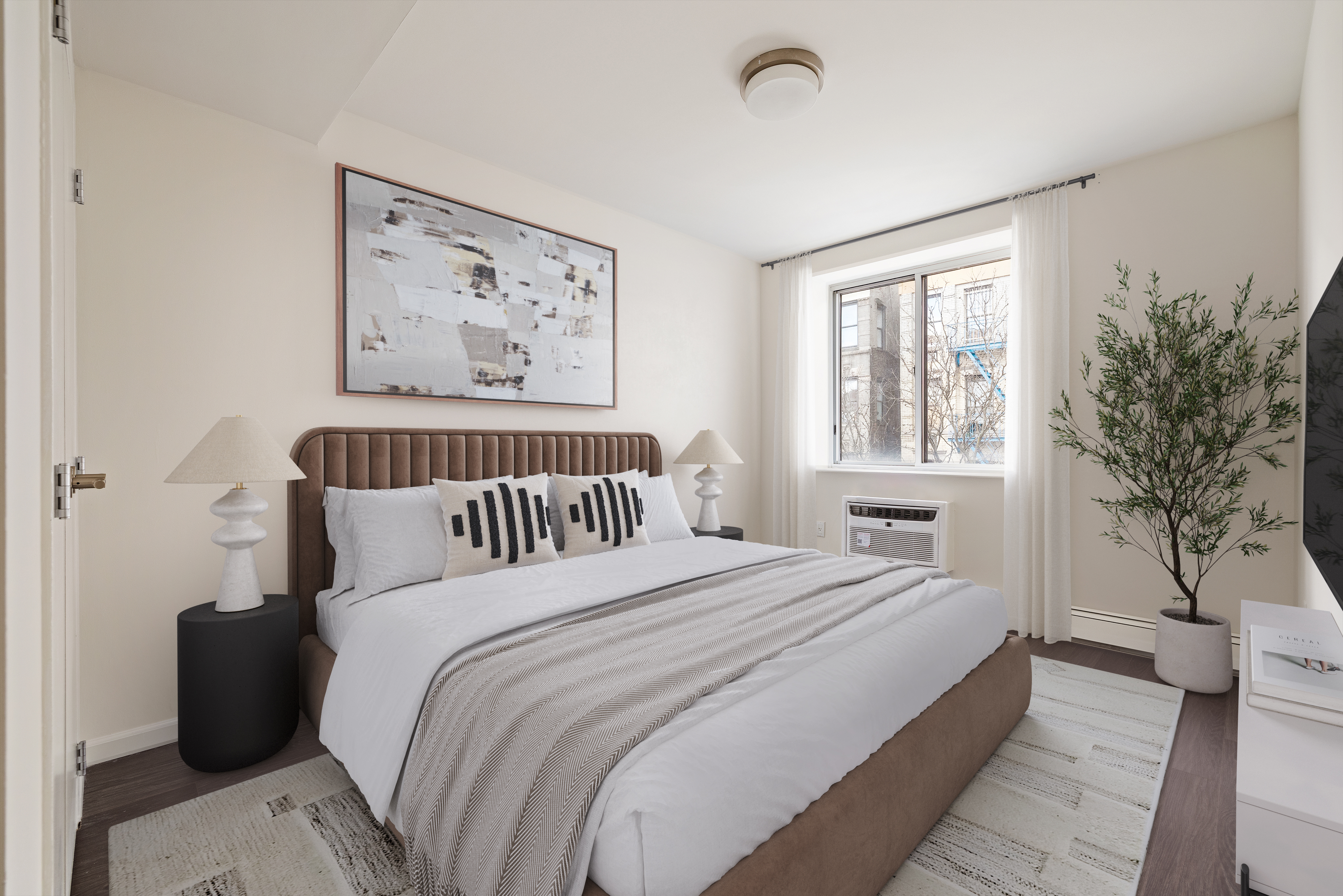 194 East 2nd Street, Unit 5B Manhattan, NY 10009 - Photo 5 of 15 a bedroom with bed painting on the wall and a window