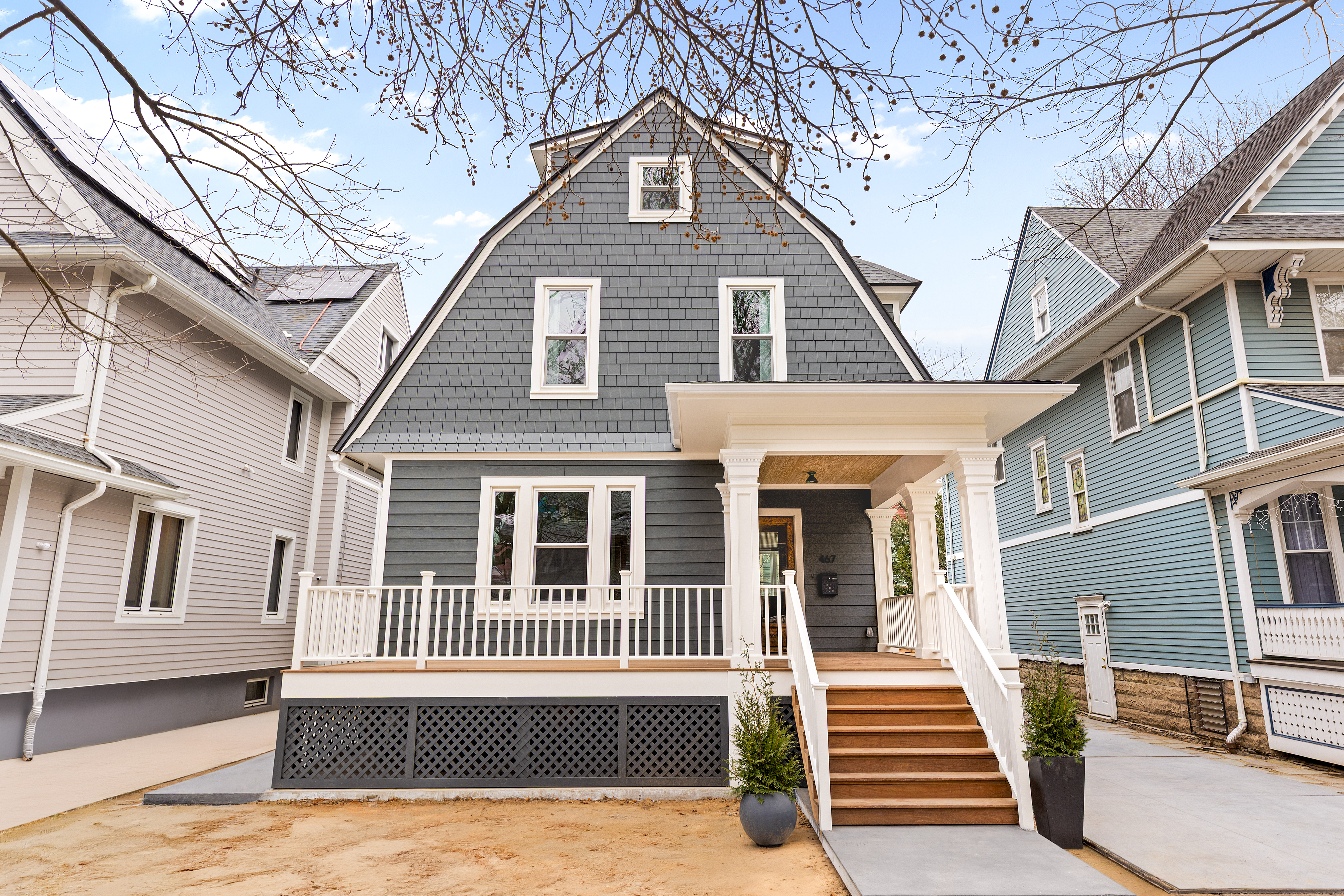 a front view of a house with a yard