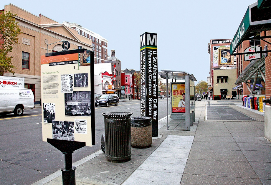 1715 15th Street Northwest, Unit 101 Washington, DC 20009 - Photo 21 of 23 a street sign on a sidewalk in front of building