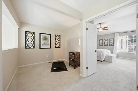 a bedroom with furniture and window