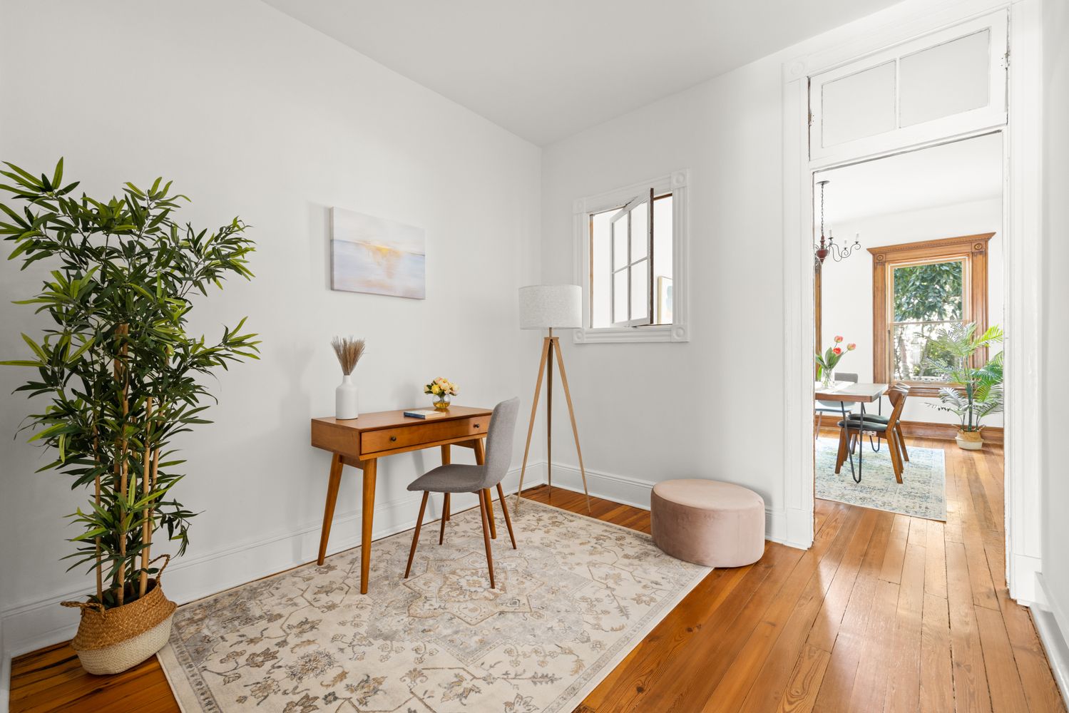 99 East 2nd Street, Unit 1 Brooklyn, NY 11218 - Photo 2 of 7 a workspace with furniture window and wooden floor