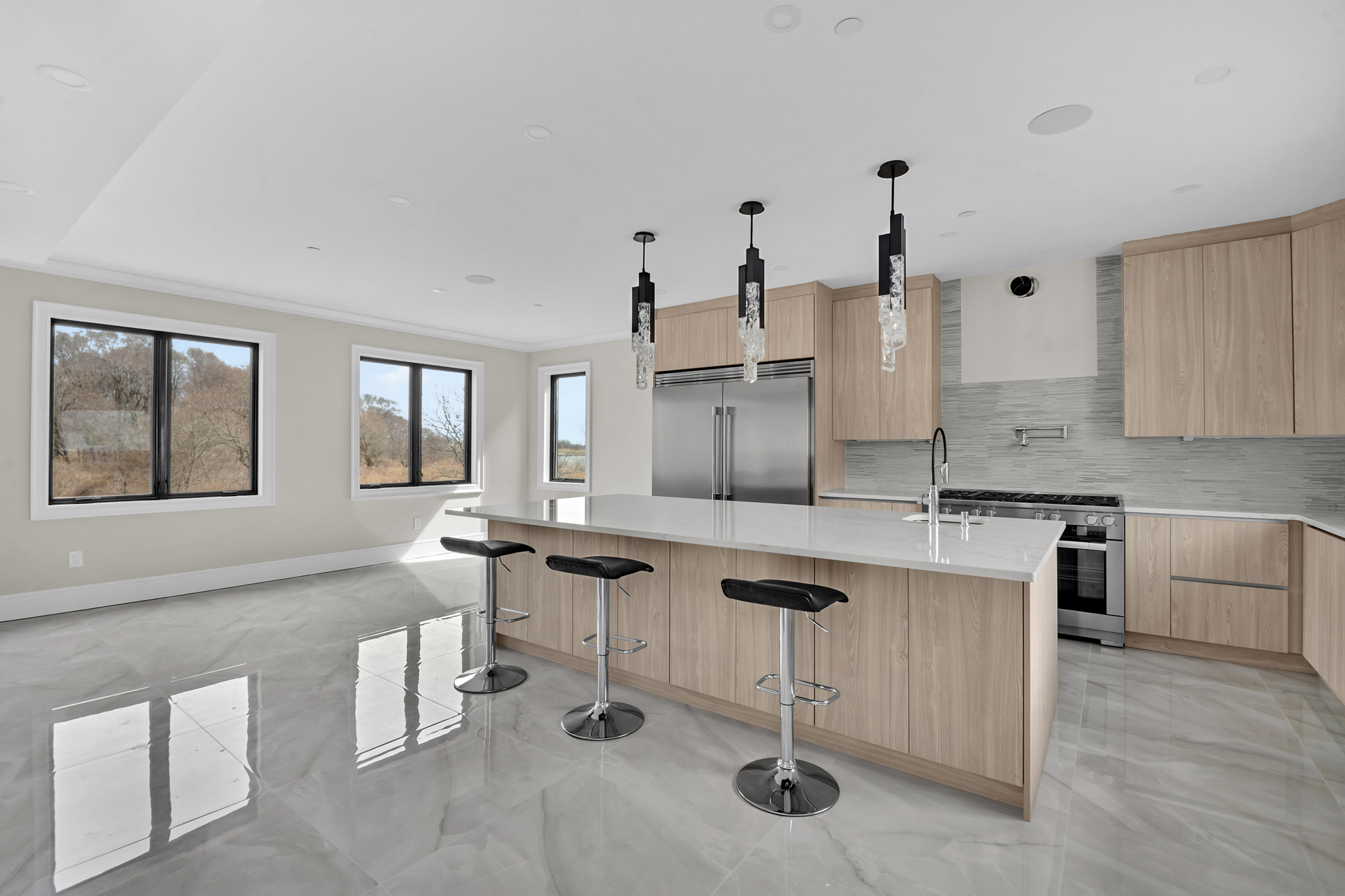 5 Osprey Court Staten Island, NY 10308 - Photo 10 of 50 a kitchen with stainless steel appliances granite countertop a sink and cabinets