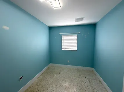 an empty room with a window