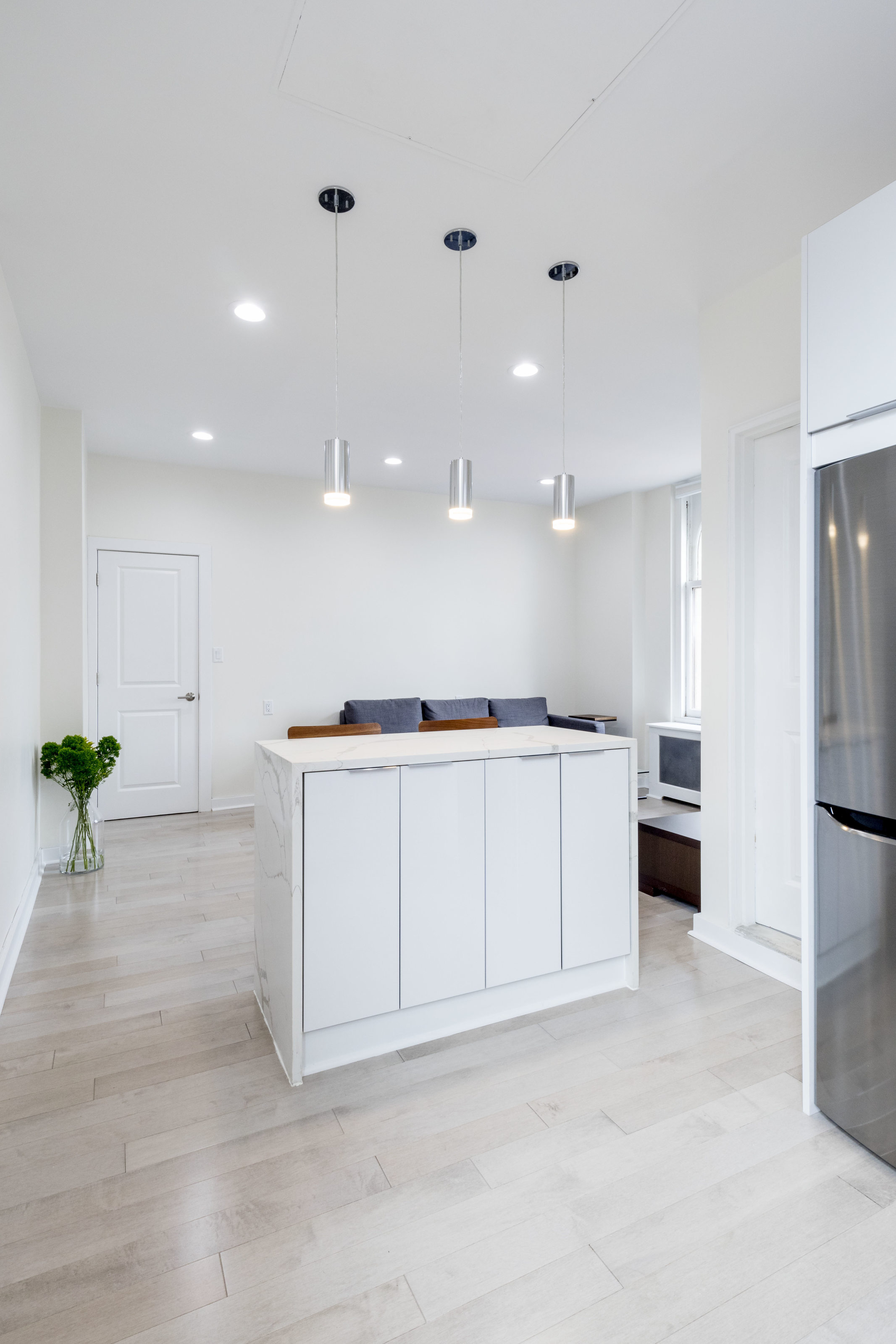 390 West End Avenue, Unit PHK Manhattan, NY 10024 - Photo 8 of 27 a view of kitchen with stainless steel appliances a refrigerator and a sink