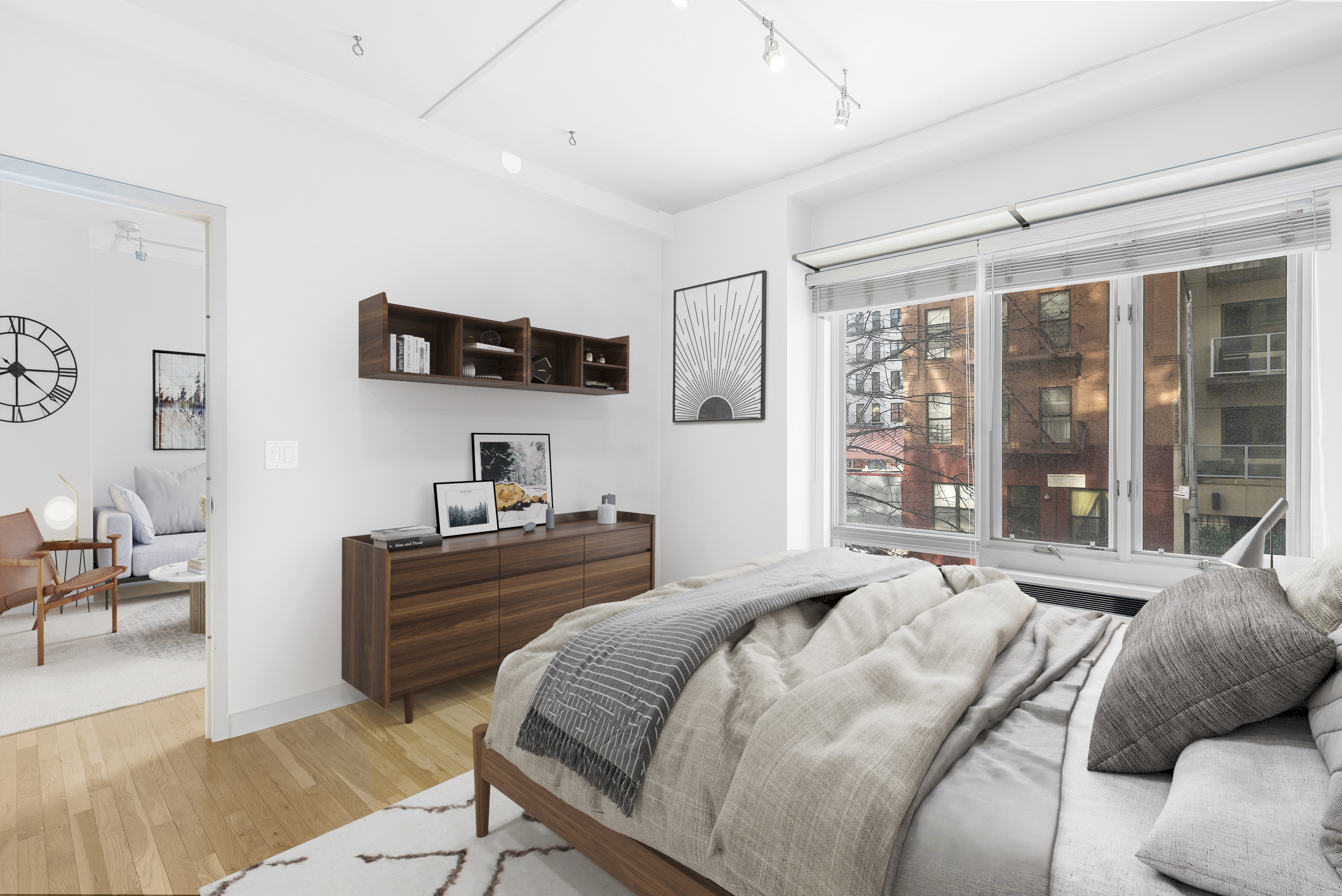 333 East 109th Street, Unit 2A Manhattan, NY 10029 - Photo 4 of 13 a bedroom with a bed and a large window