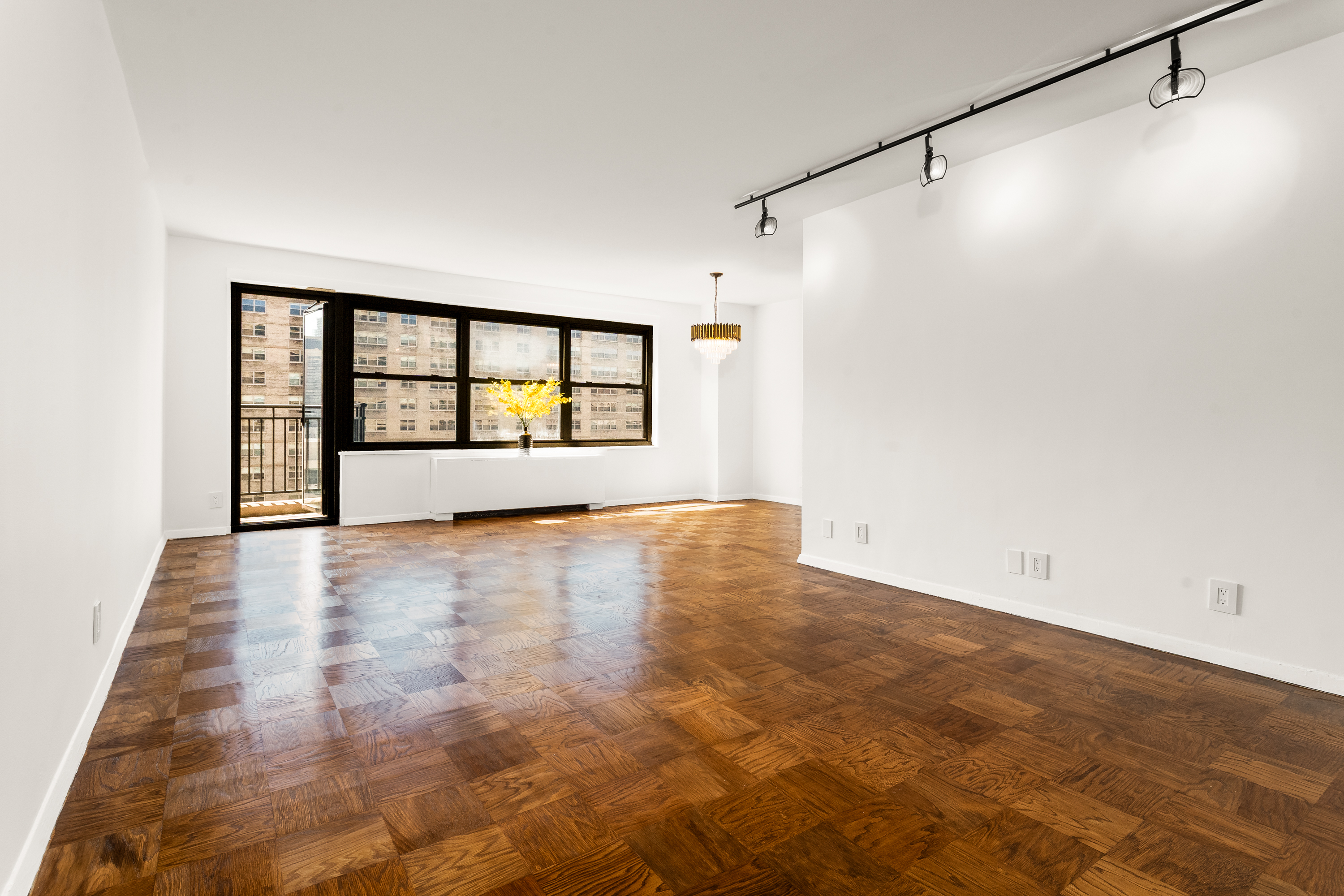 180 West End Avenue, Unit 23D Manhattan, NY 10023 - Photo 2 of 22 a view of an empty room with a window