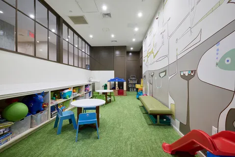 a room with furniture and pool table