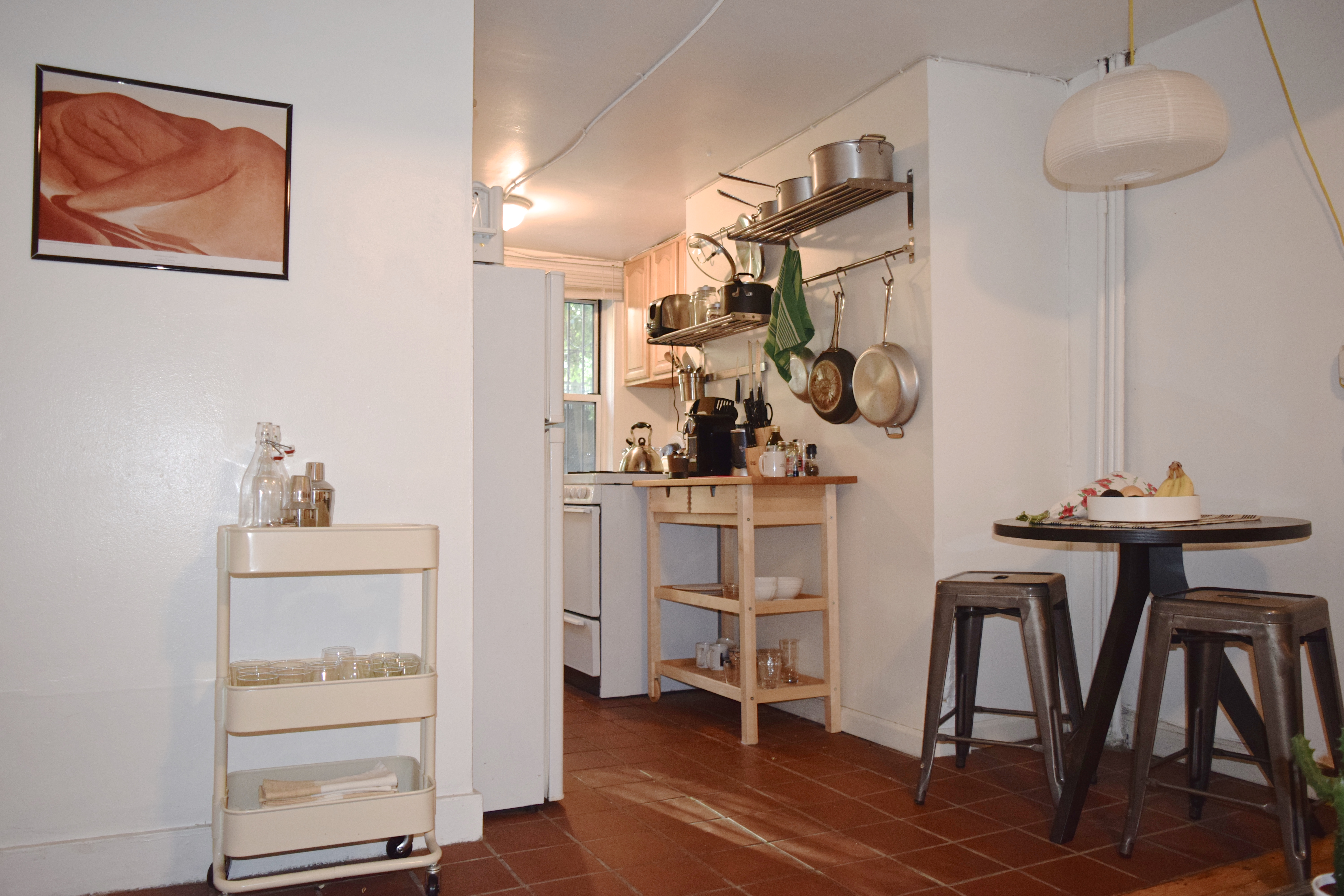 57 Duffield Street, Unit 1 Brooklyn, NY 11201 - Photo 3 of 7 a room that has a table and a chair in it