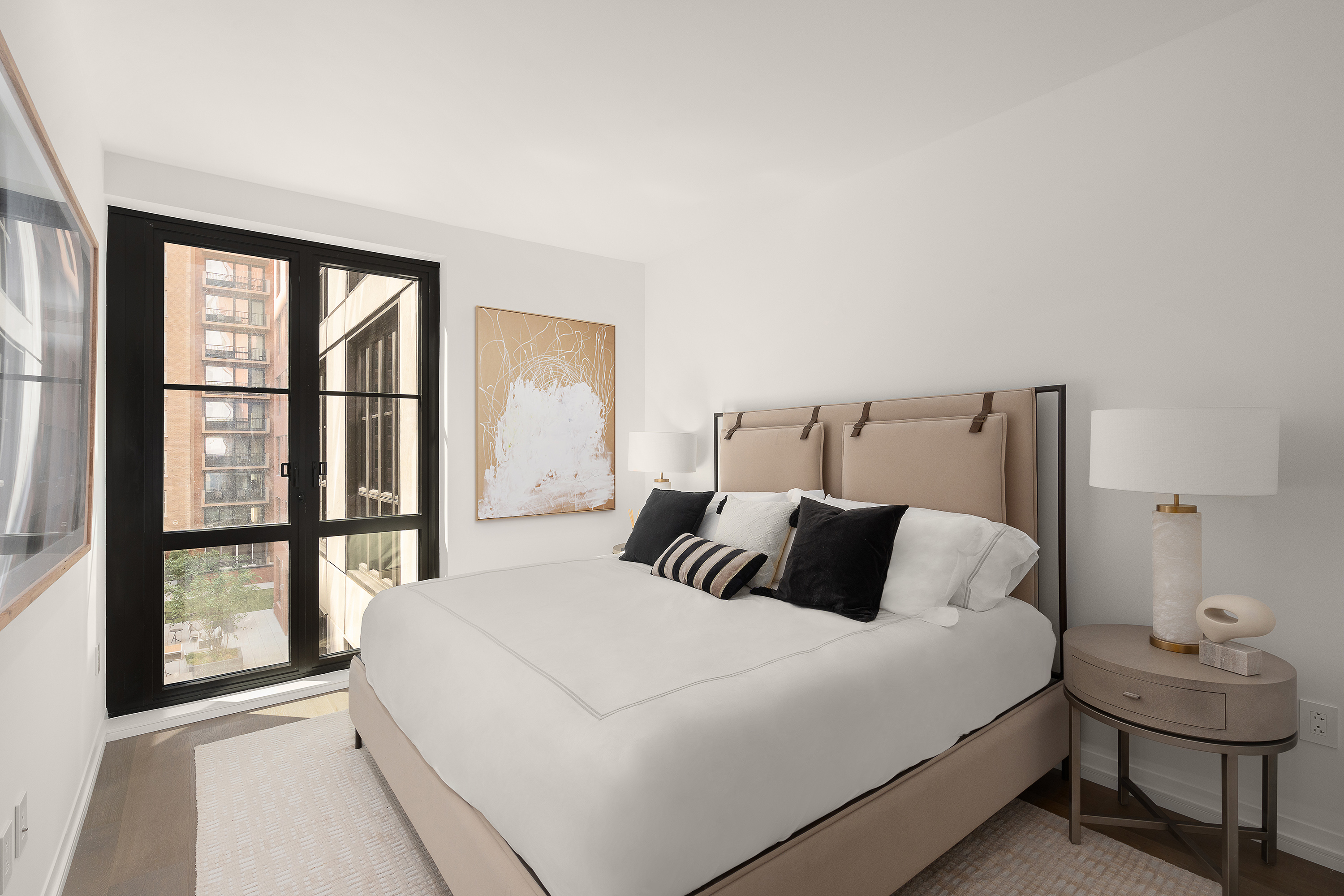 250 West 96th Street, Unit 6G Manhattan, NY 10025 - Photo 5 of 26 a bedroom with a bed and a window